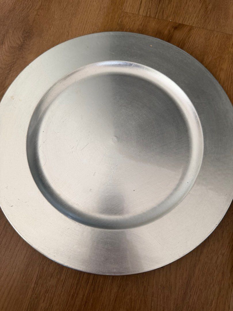 Silver Charger Plates (Category: Dinnerware & Cutlery) located in Pasig City. Submitted by riccimoi (Listing ID 1419456848, Image 1). Description: 400 take all.