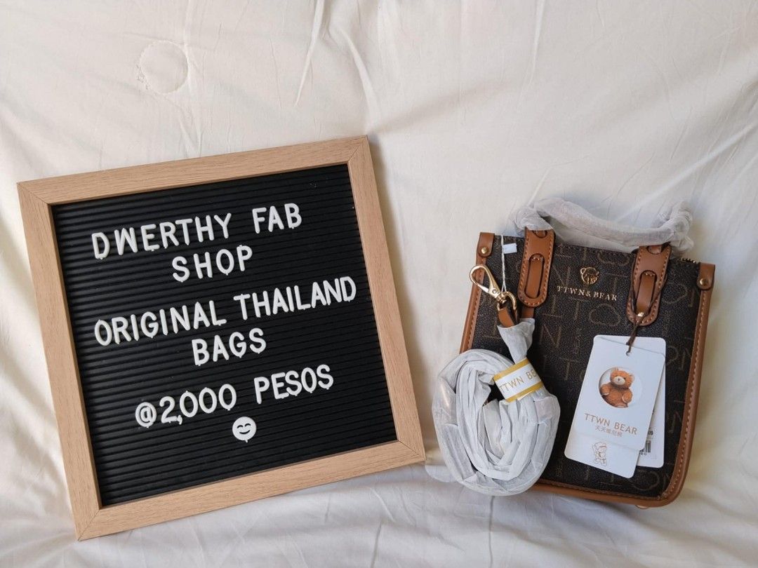 Tewn & Bear Original Thailand Bag (Category: Tote Bags) located in General Mariano Alvarez. Submitted by deslacbayan (Listing ID 1419474602, Image 3). Description: Original Thailand bags. Available in multiple colors. Each bag comes with a tag and a teddy bear charm. The price is 2,000 pesos. The bags appear to be new and unused..