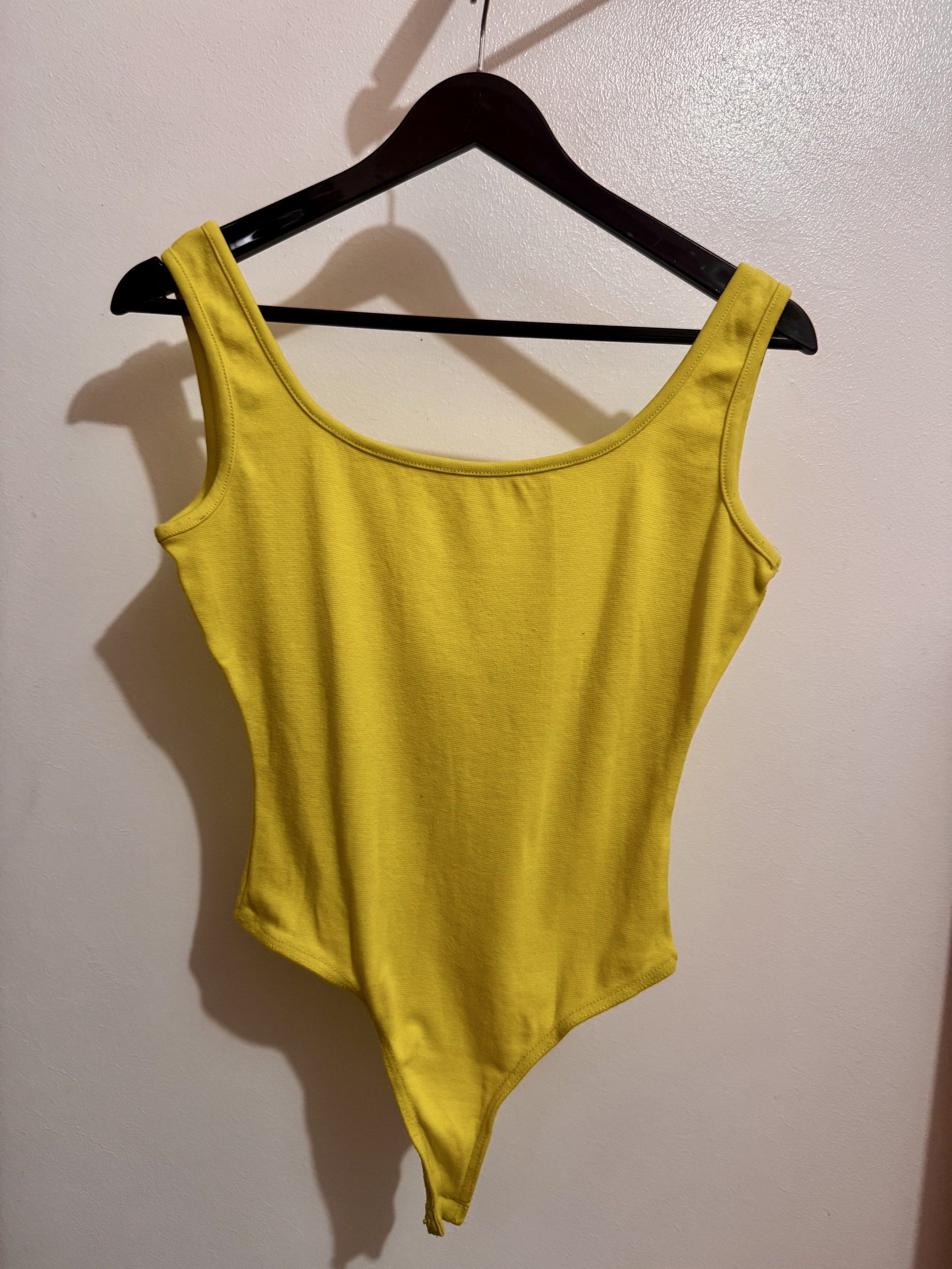 Yellowgreen low back tank bodysuit (Category: Others Tops) located in Mexico. Submitted by studioleraph (Listing ID 1419498200, Image 1). Description: F01-3 Yellowgreen low back tank bodysuit Condition: Pre-loved; Please manage expectations ✨ Size: S Price: 180 💰 Payment first 🛒 Shipping not included, PM for details 🙅🏻‍♀️ No Joy Reservers or Scammers 🙆🏻‍♀️ You deserve this piece 🩷 Only one item #preloved #tops #bodysuit #available #Fashion