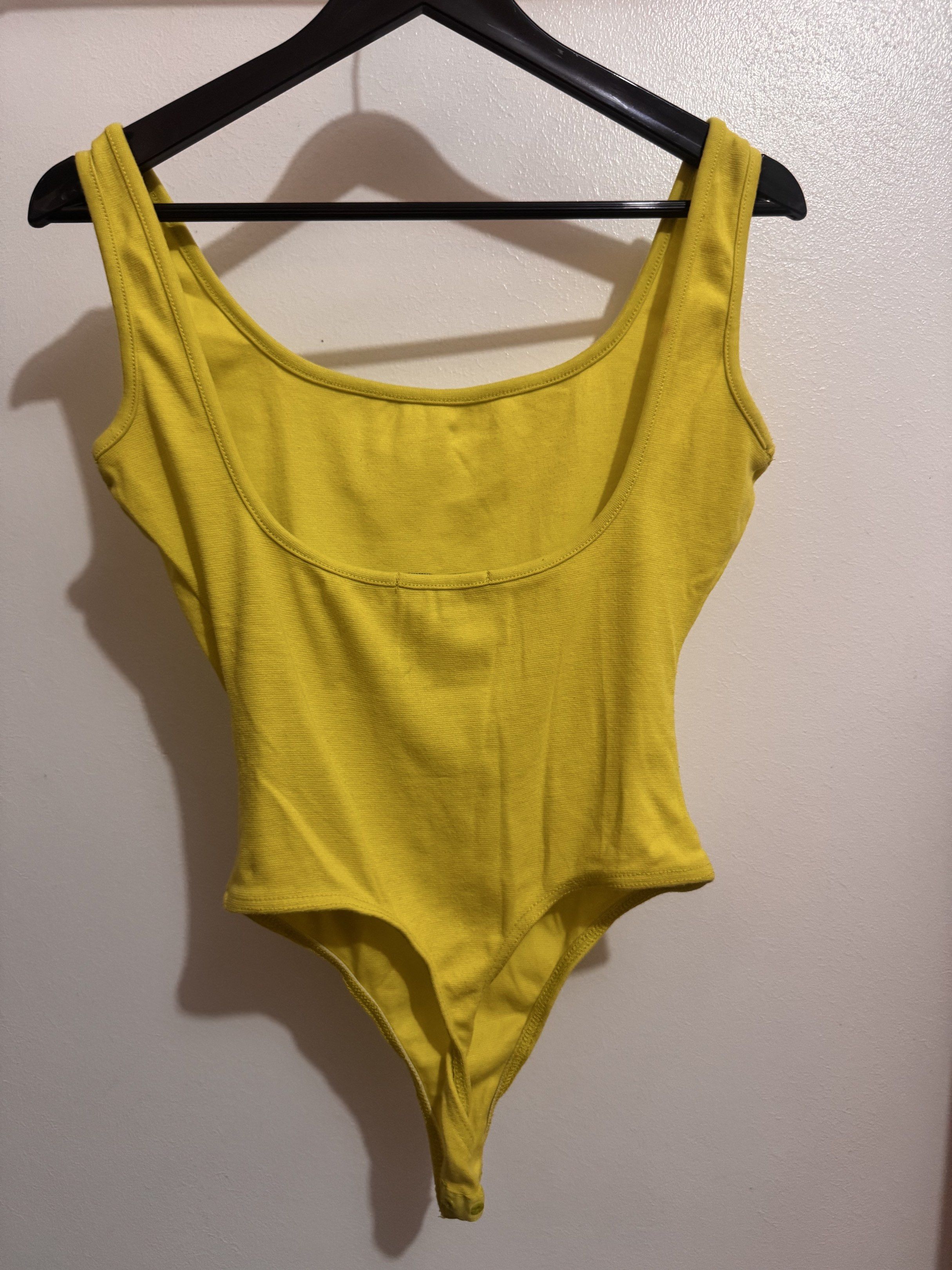 Yellowgreen low back tank bodysuit (Category: Others Tops) located in Mexico. Submitted by studioleraph (Listing ID 1419498200, Image 3). Description: F01-3 Yellowgreen low back tank bodysuit Condition: Pre-loved; Please manage expectations ✨ Size: S Price: 180 💰 Payment first 🛒 Shipping not included, PM for details 🙅🏻‍♀️ No Joy Reservers or Scammers 🙆🏻‍♀️ You deserve this piece 🩷 Only one item #preloved #tops #bodysuit #available #Fashion
