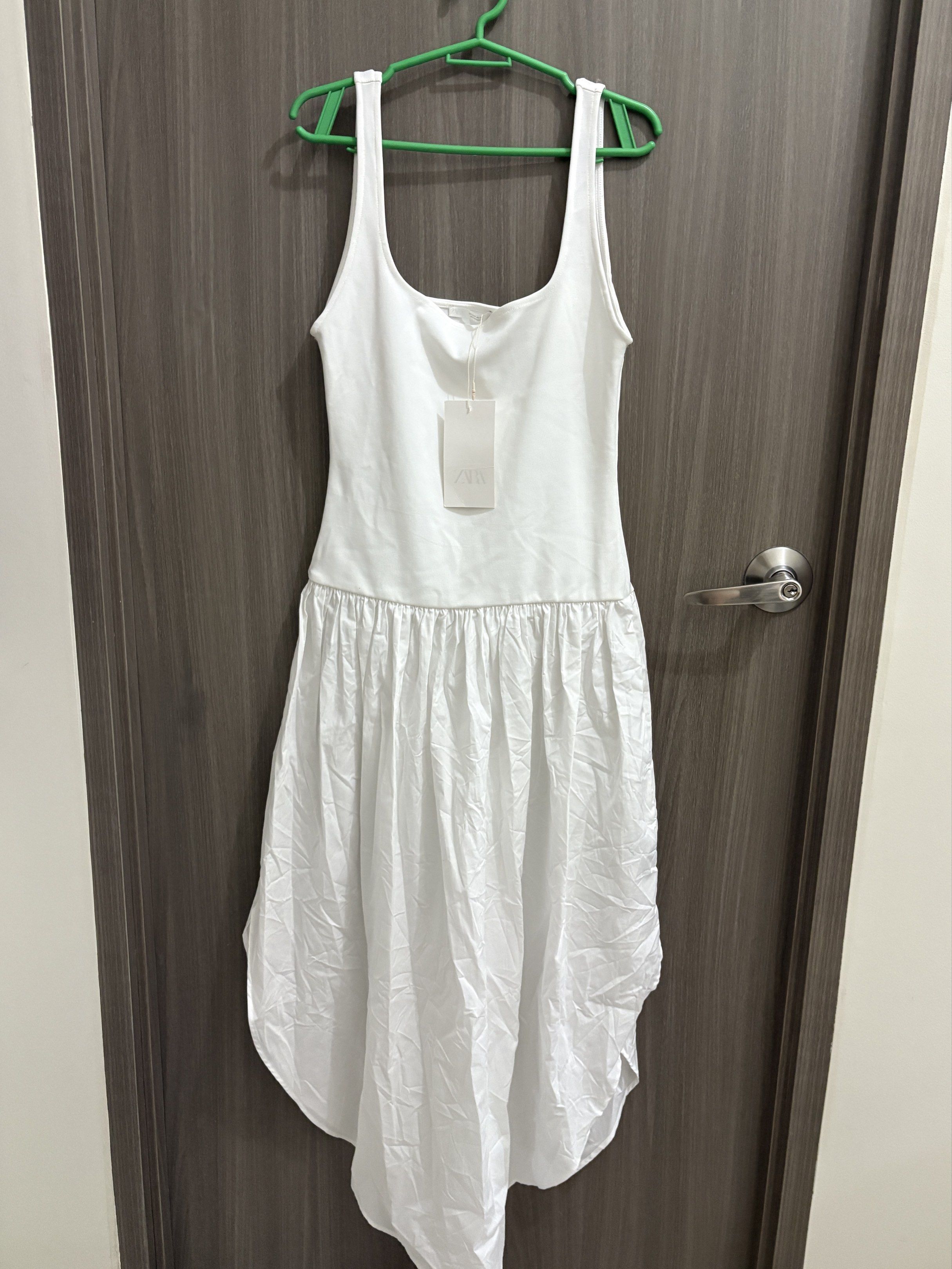 Zara Midi Dress (Category: Dresses) located in Manila. Submitted by dkarchives (Listing ID 1419515781, Image 3). Description: Zara Midi Dress - color: oyster white - brand new with tag! - steal already, retails for P2395 (can send photo of tag) - rfs: would love to keep but i don’t have any event to wear it with - open to nego helping tags: zara h&m hm miu the label wear anika carino ava the brand beyond collective phia the label helping tags: ed