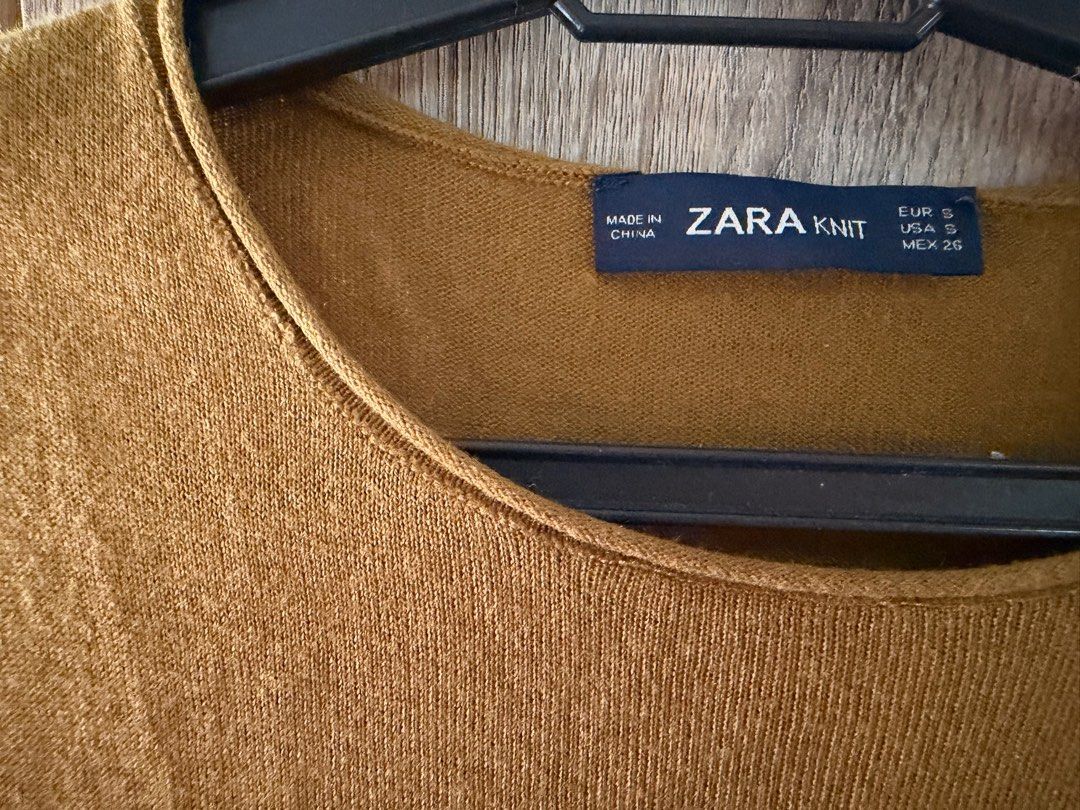 Zara Olive Green Knit Shirt (Category: Shirts) located in Quezon City. Submitted by closetsweeper11 (Listing ID 1419456922, Image 2). Description: Still in good condition. Size S is more XS-S for this knitted shirt. RFS: Weight gain .