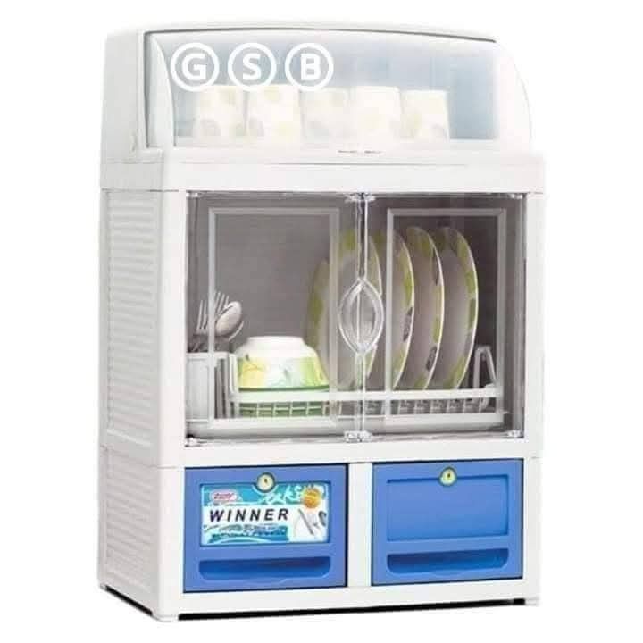 Zooey Winner Dish Cabinet (Category: Shelves, Cabinets & Racks) located in Makati City. Submitted by vsharon362 (Listing ID 1419414716, Image 2). Description: - Zooey Winner dish cabinet - Clear door - Two drawers - Top shelf for extra storage - Includes dish rack and utensil holder - Keeps dishes clean and organized - White and blue color scheme.