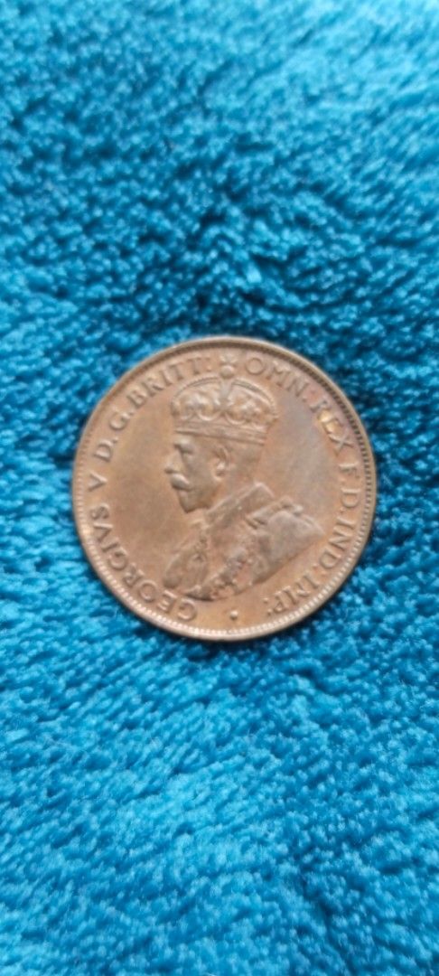 1929 Australian One Half Penny Coin (Category: Currency) located in Manila. Submitted by danlei_coin_collectible (Listing ID 1419632334, Image 1). Description: - 1929 Australian One Half Penny coin - Features King George V on the obverse - Reverse: "ONE HALF PENNY" and "COMMONWEALTH OF AUSTRALIA" - Made of copper - Collectible item.