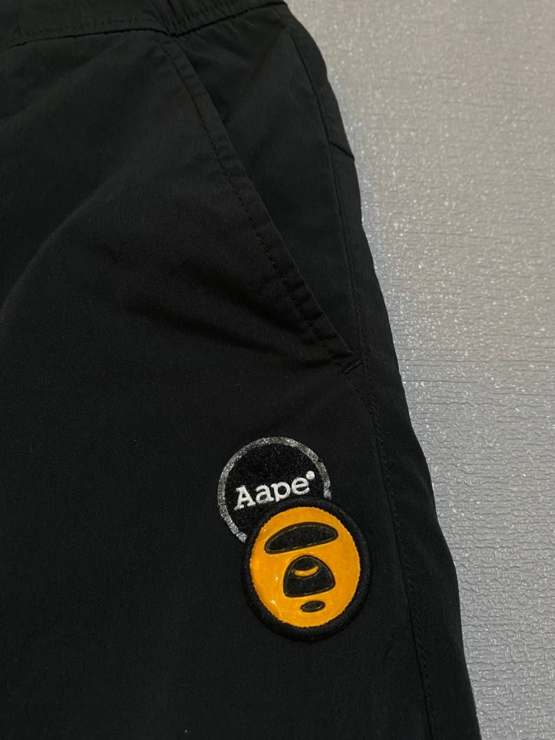 AAPE Orange Patch Black Joggers (Category: Joggers) located in Antipolo. Submitted by mogulcollective (Listing ID 1419774546, Image 3). Description: AAPE Orange Patch Black Joggers Authentic Excellent condition Large on tag Waist - 32-36 Length - 37 Leg Opening - 6 .