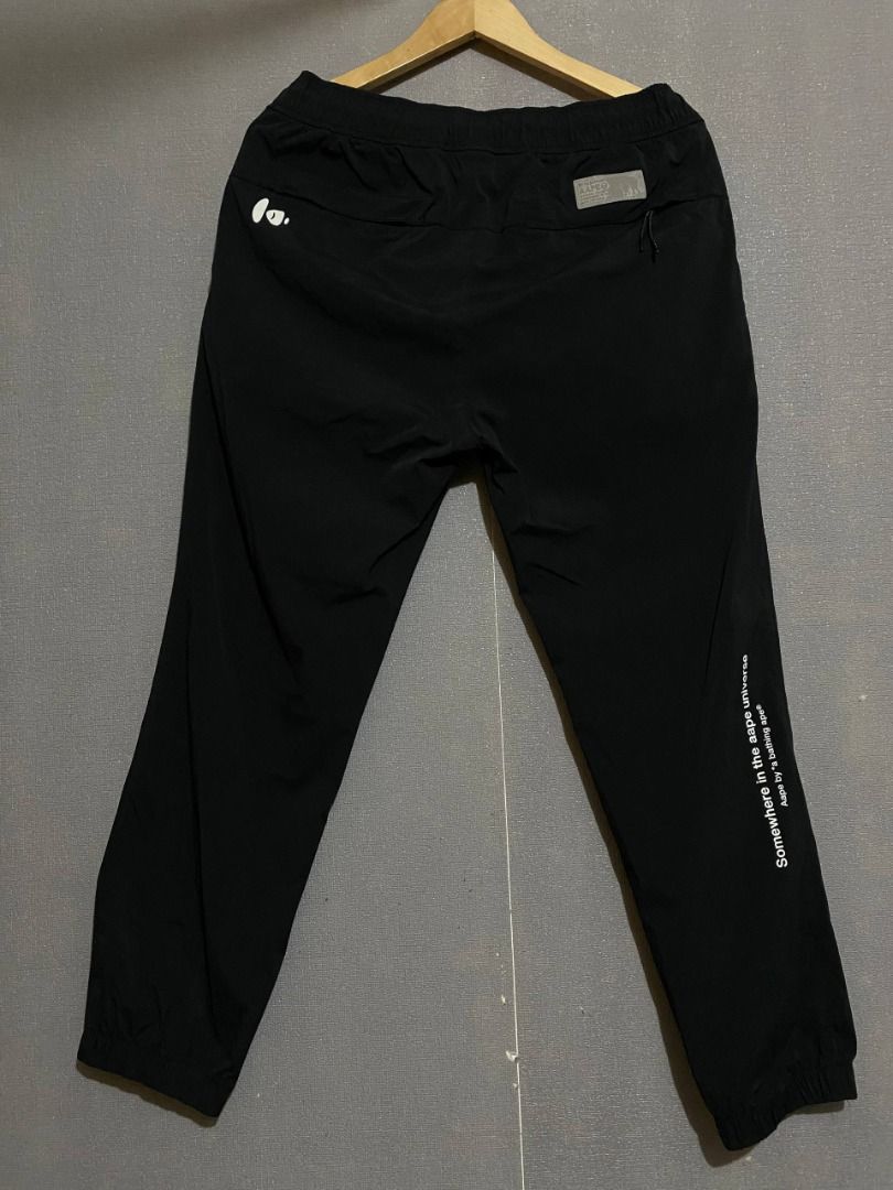 AAPE Orange Patch Black Joggers (Category: Joggers) located in Antipolo. Submitted by mogulcollective (Listing ID 1419774546, Image 2). Description: AAPE Orange Patch Black Joggers Authentic Excellent condition Large on tag Waist - 32-36 Length - 37 Leg Opening - 6 .