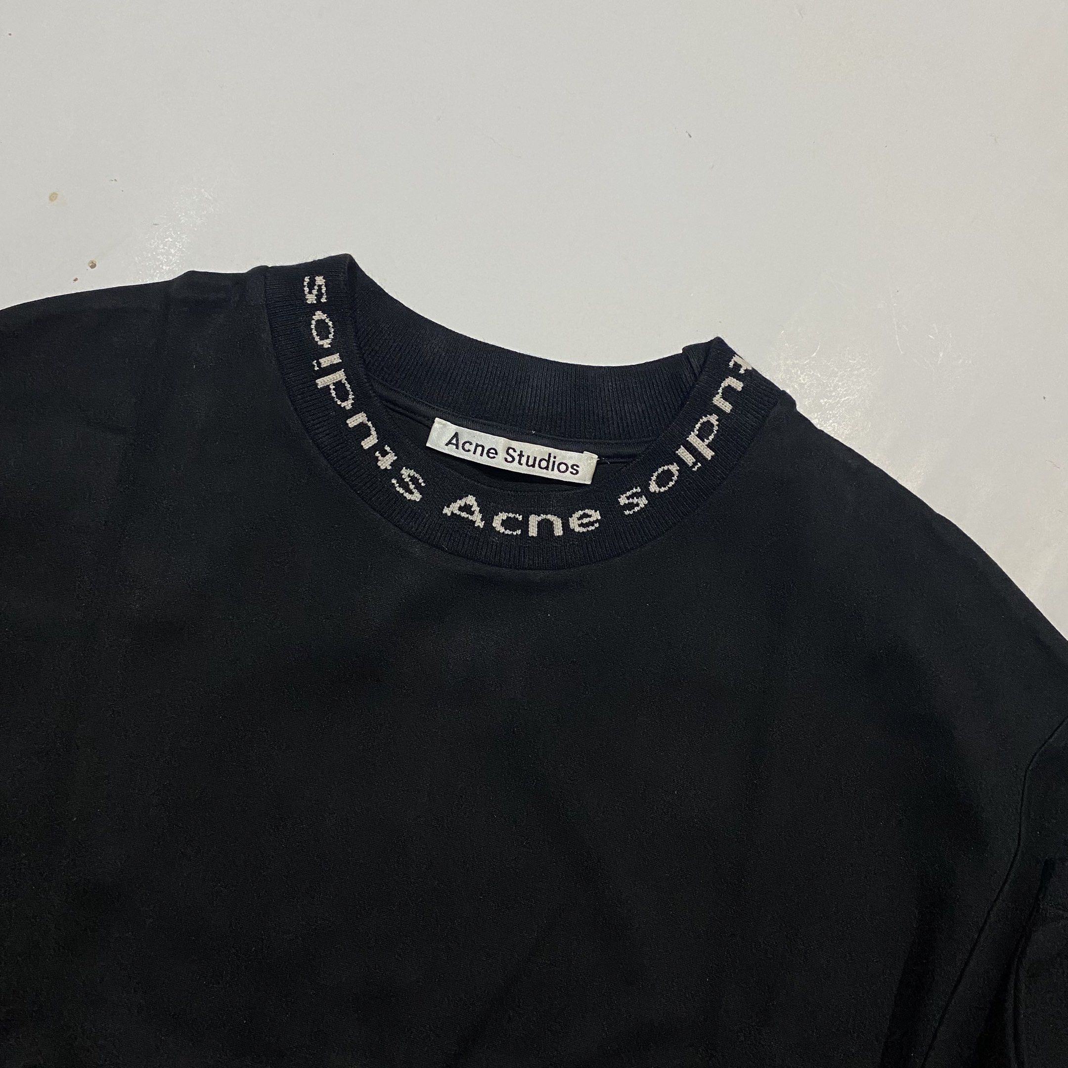 Acne Studios Logo Rib Tee (Category: Luxury Apparel) located in Victorias. Submitted by preluxe_ph (Listing ID 1419733143, Image 2). Description: 20 width 28 length pristine condition no flaws.