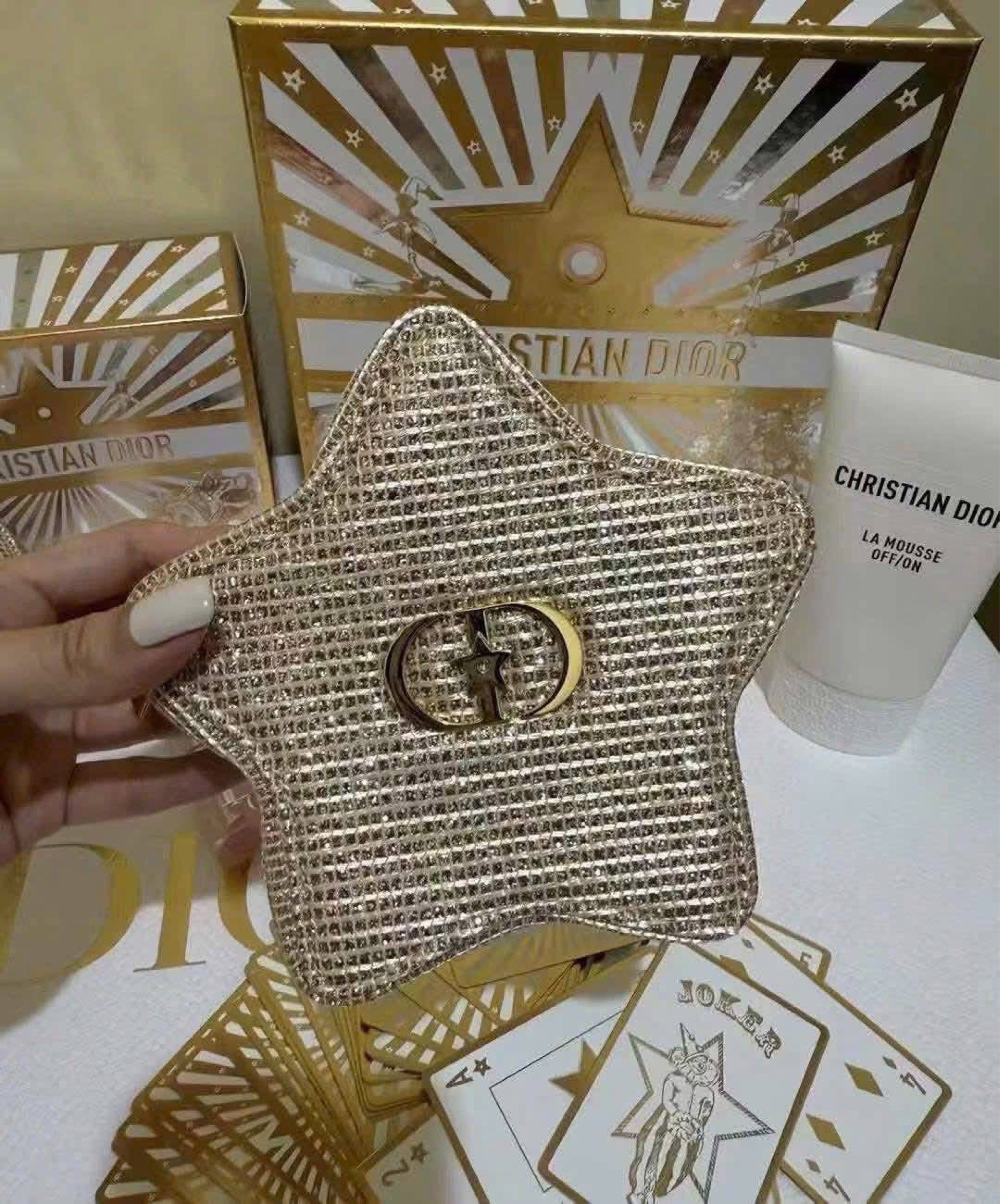 Authentic GWP Christian Dior Star Bag with Chain (Category: Luxury Bags & Wallets) located in Bacoor. Submitted by shynemf.beloy (Listing ID 1419596618, Image 2). Description: Authentic GWP ✨ 2025 CD Holiday Star Sling Bag - 20 slots left – 1,800 complete with box and paper bag - Gold chain strap - Gold exterior with CD logo - Includes box and Christian Dior product - Perfect for any occasion.