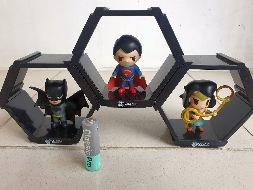 Batman v Superman SM Cinema Hexagon Display figures (Category: Figurines & Statues) located in Quezon City. Submitted by nextnoel (Listing ID 1419768816, Image 1). Description: Batman v Superman SM Cinema Hexagon Display figures = 500 (sold as a set) - SM Cinema collectibles based off the movie Batman v Superman, released 10 years ago in 2016. Meet-ups can be arranged, but pick-up through couriers is preferred..