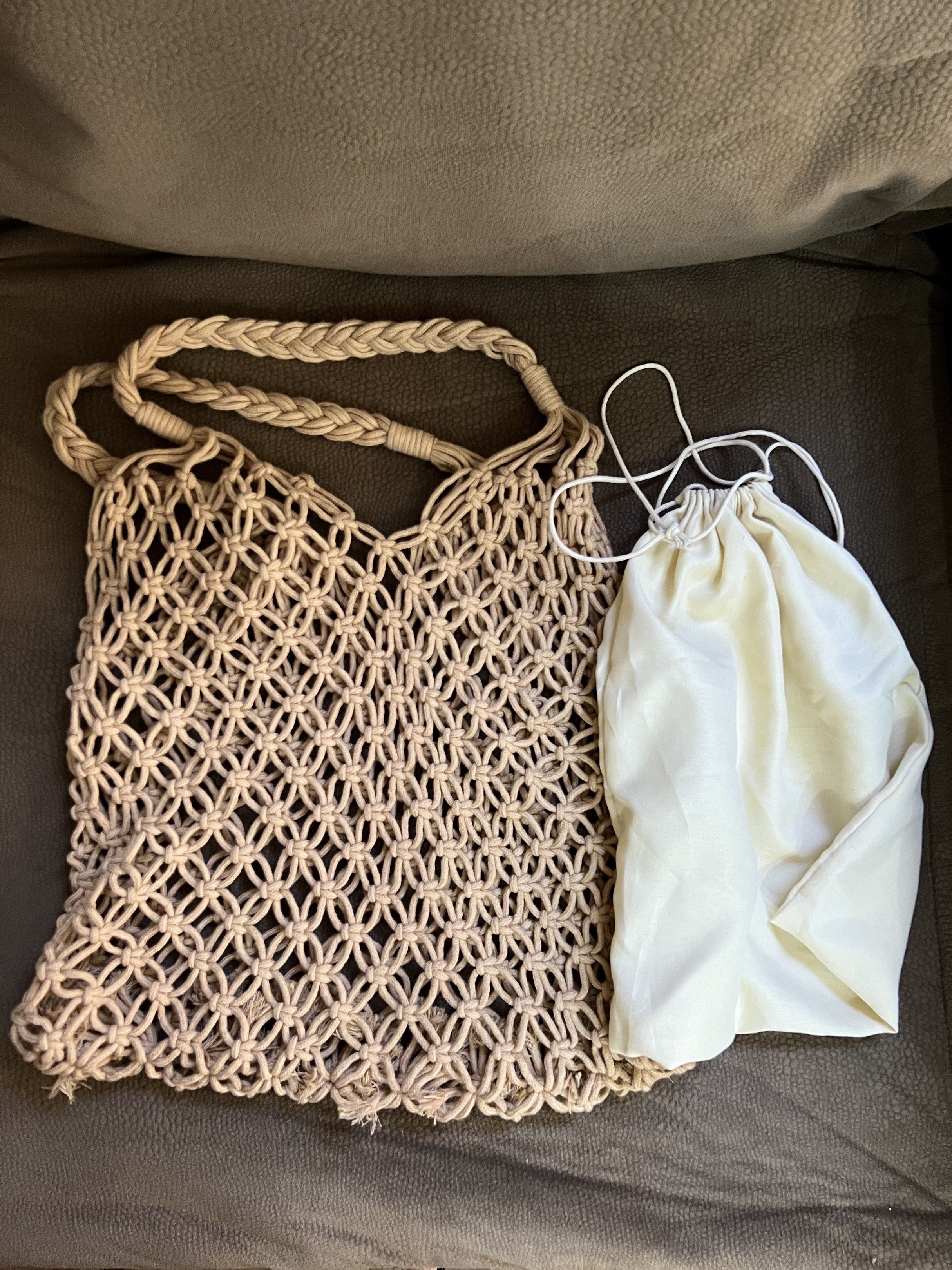 Beige Macrame Tote Beach Bag (Category: Beach Bags) located in Quezon City. Submitted by bfindsph_26 (Listing ID 1419700046, Image 2). Description: beige macramé net tote bag with braided straps and a separate inner drawstring pouch. This style of bag is popular for beach outings, casual shopping, and general everyday use due to its durable and bohemian design. The open-weave design of the macramé bag is complemented by the included fabric pouch 