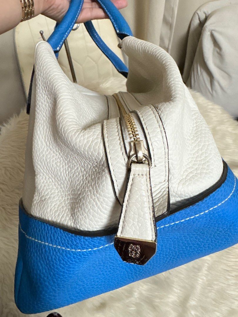 Bruno Magli 2 way Bag with Sling (Category: Shoulder Bags) located in Cavite. Submitted by jdbprelovedbagsph (Listing ID 1419750495, Image 3). Description: Bruno Magli Doctors Bag with sling Genuine leather Large bag In good condition Minor issue: May super light na mga parang batik na stain sa bandang baba , Pero in person hindi po ganon kahalata. Please check po sa last photo. no reservation Strictly payment first. For sure buyers only MOP: BDO