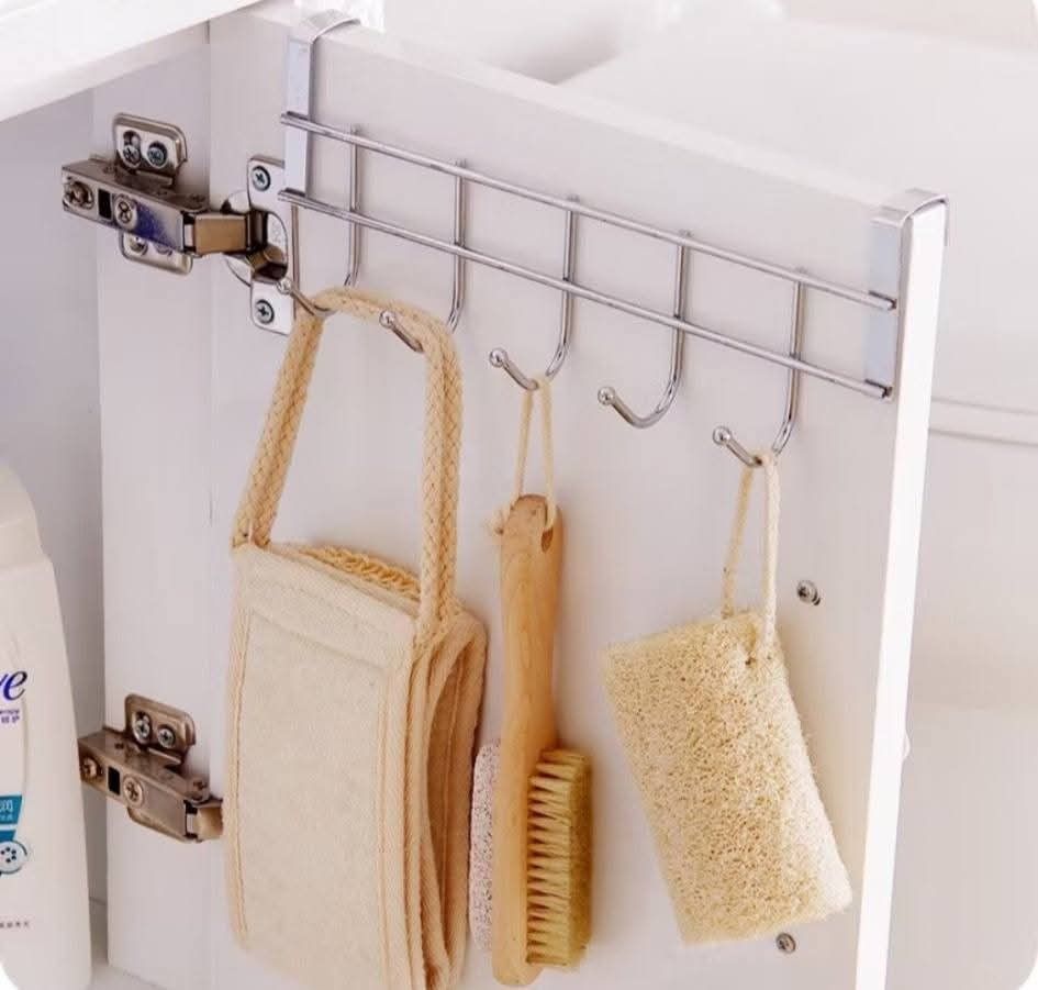 Cabinet Door Back Hook (Category: Shelves, Cabinets & Racks) located in Manila. Submitted by householdproducts. (Listing ID 1419668849, Image 1). Description: - Cabinet door back hook for extra storage. - Ideal for bathrooms and kitchens. - Features multiple hooks for hanging items. - Fits over cabinet doors. - Saves counter space. - Easy to install. - Keeps your space organized..