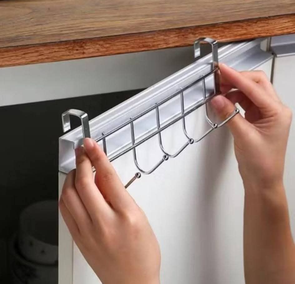 Cabinet Door Back Hook (Category: Shelves, Cabinets & Racks) located in Manila. Submitted by householdproducts. (Listing ID 1419668849, Image 3). Description: - Cabinet door back hook for extra storage. - Ideal for bathrooms and kitchens. - Features multiple hooks for hanging items. - Fits over cabinet doors. - Saves counter space. - Easy to install. - Keeps your space organized..