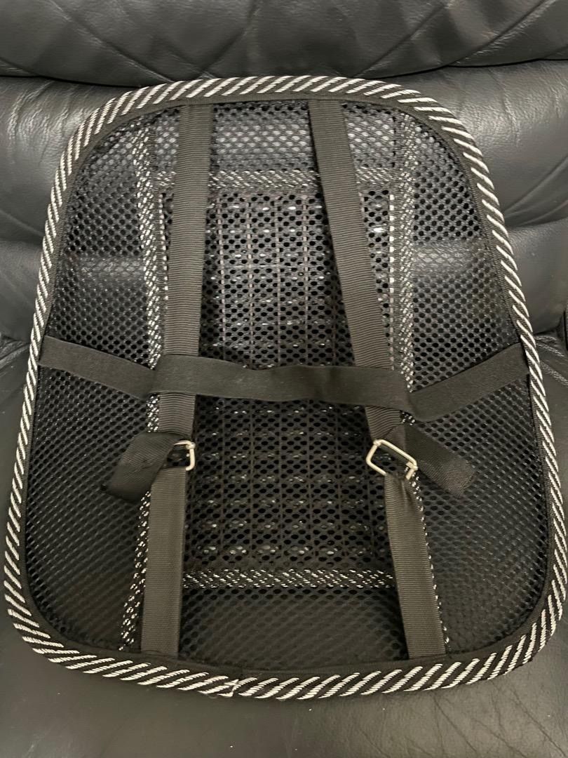 Car Back Rest (Category: Braces, Support & Protection) located in Makati City. Submitted by gmc730 (Listing ID 1419773827, Image 2). Description: - Mesh back support with wooden beads for added comfort. - Designed for lumbar support. - Features a black frame with white and gray trim. - Suitable for use on car driver seat..
