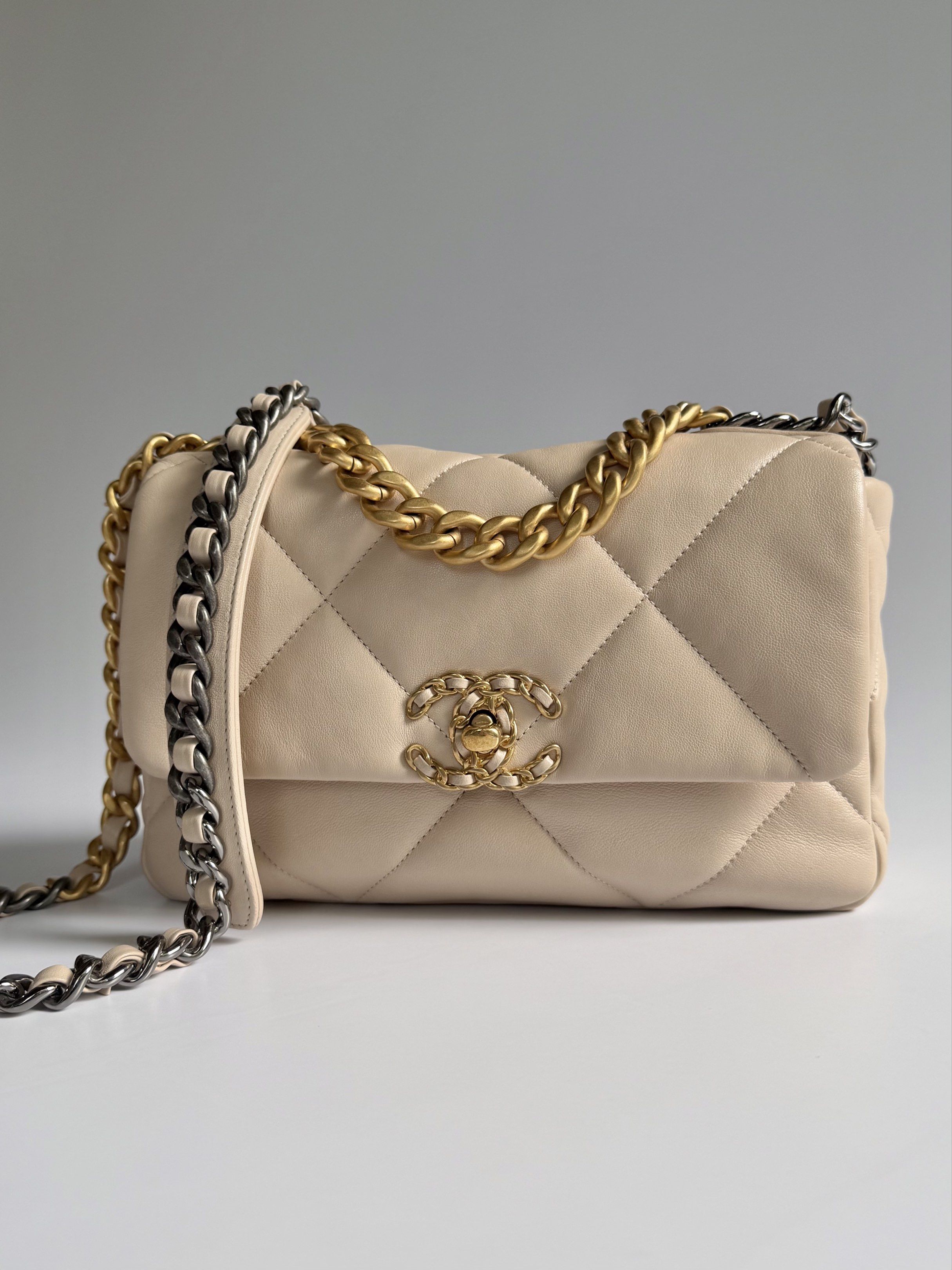 Chanel 19 Small in Light Beige with Mixed Hardware (Microchip) (Category: Luxury Bags & Wallets) located in Quezon City. Submitted by lian_closet (Listing ID 1419618243, Image 2). Description: C19 Small in Light Beige with Mixed Hardware (Microchip) Best Price: ₱230,000 Preloved, Pristine Comes with Dust Bag, Care Booklet, Wiper, Box, Ribbon, Camellia & LegitGrails Authenticity Certificate Preloved Rating: 9.7/10 Pristine Minimal No rubs on corne