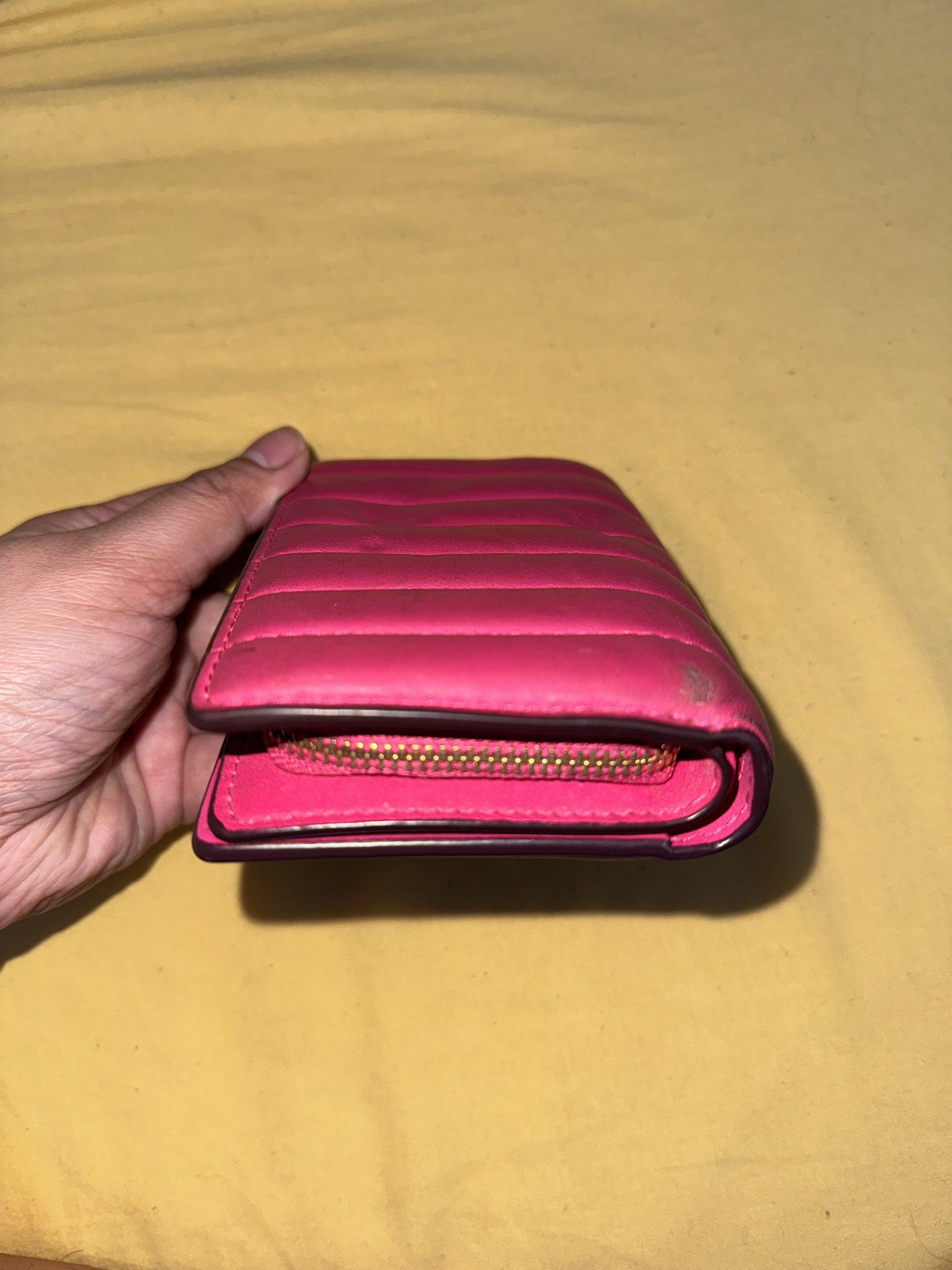Coach Medium Corner Zip Wallet – Quilted | Preloved | Authentic (Category: Luxury Bags & Wallets) located in San Jose del Monte. Submitted by trxlntt (Listing ID 1419739358, Image 3). Description: • Preloved Coach Medium Corner Zip Wallet with Quilting in bold pink leather • Bought in 2022 from IG seller @mommyshopper_official • Compact and functional wallet (card slots, bill compartment, zip coin pocket) • Color: Bold Pink Condition: • Good cond