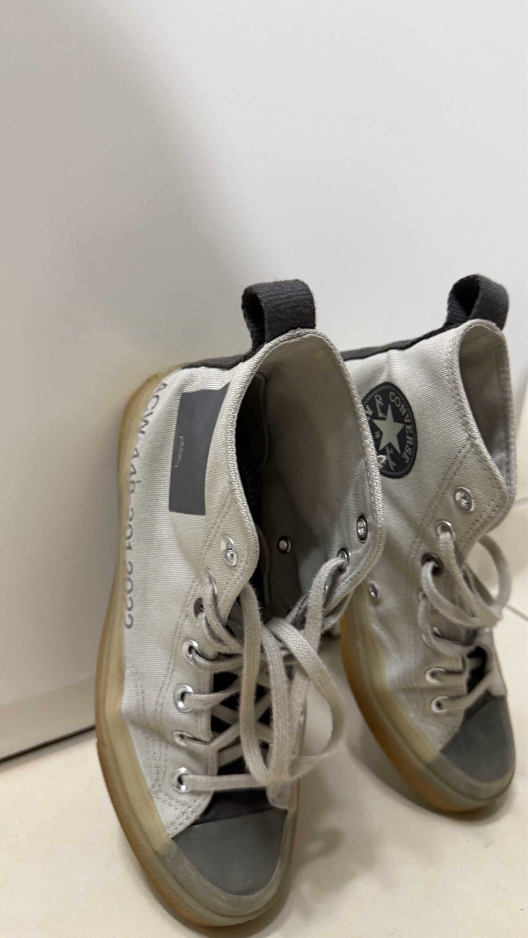 Converse Chuck Taylor ACW High Top Sneakers (Category: Sneakers) located in Quezon City. Submitted by elsa_592 (Listing ID 1419691430, Image 1). Description: - LIMITED EDITION COLLABORATION EITH A COLD WALL Converse Chuck Taylor high-top sneakers - White canvas upper - Grey accents on toe cap and heel - Translucent sole - ACW branding - Size: US 8 Men's / US 10 WMNS Authentic. No more box. Rfs: Decluttering to many shoes .