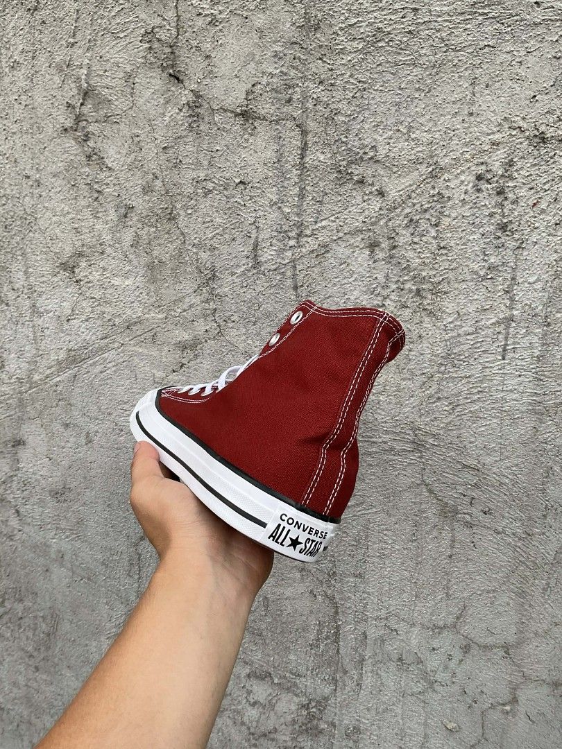 Converse Chuck Taylor All Star High Top - Maroon (Category: Sneakers) located in Zamboanga. Submitted by weartogobyco. (Listing ID 1419756174, Image 3). Description: - Maroon Converse Chuck Taylor All Star high-top sneakers - Iconic Converse All Star patch - White laces and toe cap - Brown sole with Converse logo - Comes with original box.