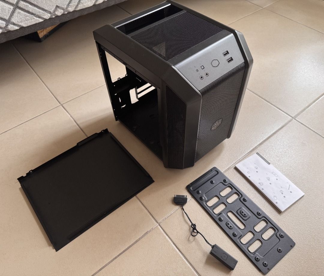 Cooler Master Mastercase H100 ITX casing (Category: Computer Parts) located in Makati City. Submitted by catalinolilia (Listing ID 1419611887, Image 3). Description: - Cooler Master Mastercase H100 ITX casing - Compact design - Front panel USB and audio ports - Includes: - Case - Mounting bracket - Original box included - Manual Note : missing video screw cover.