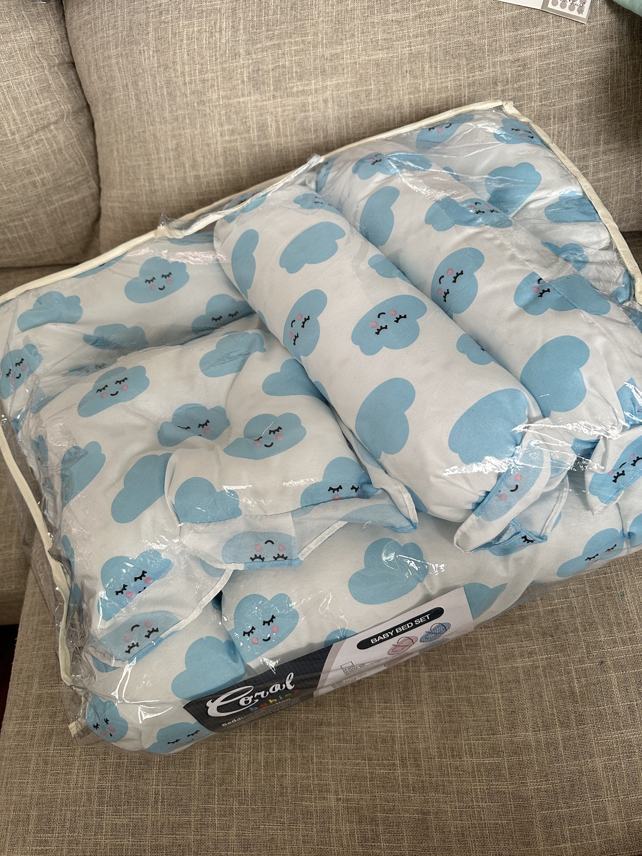 Coral Babies Baby Bed Set (Category: Children's Beds) located in Cavite. Submitted by papriloved (Listing ID 1419645027, Image 1). Description: Coral Babies baby bed set with cloud design Includes: bed, two bolsters, and a pillow .