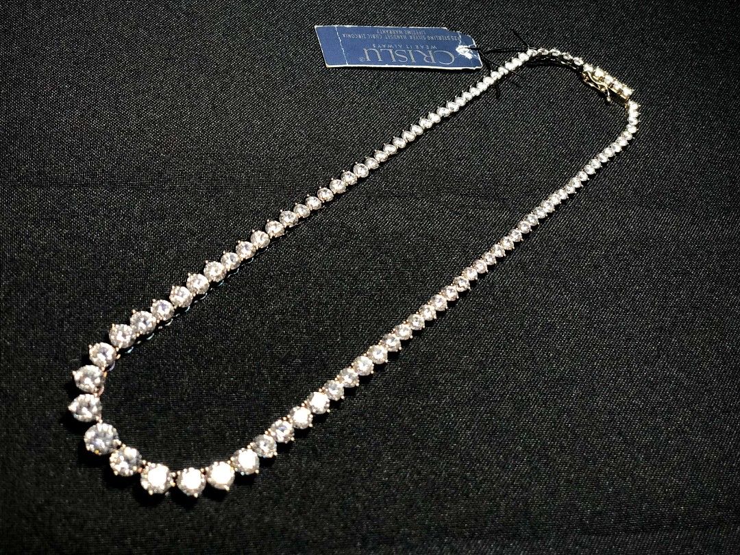 Crislu Graduated Tennis Necklace (Category: Necklaces) located in Bulacan. Submitted by koolstuffs_29 (Listing ID 1419752924, Image 3). Description: CRISLU 925 Sterling Silver Handset Cubic Zirconia Graduated Bezel Dipped Gold Finished Tennis Necklace 🤩 Excellent Condition Price 14,200 + shipping/delivery fee. Interested takers just comment MINE/SOLD! DM for more info/fast transactions! Marilao,Bulacan Thank you 🙂.