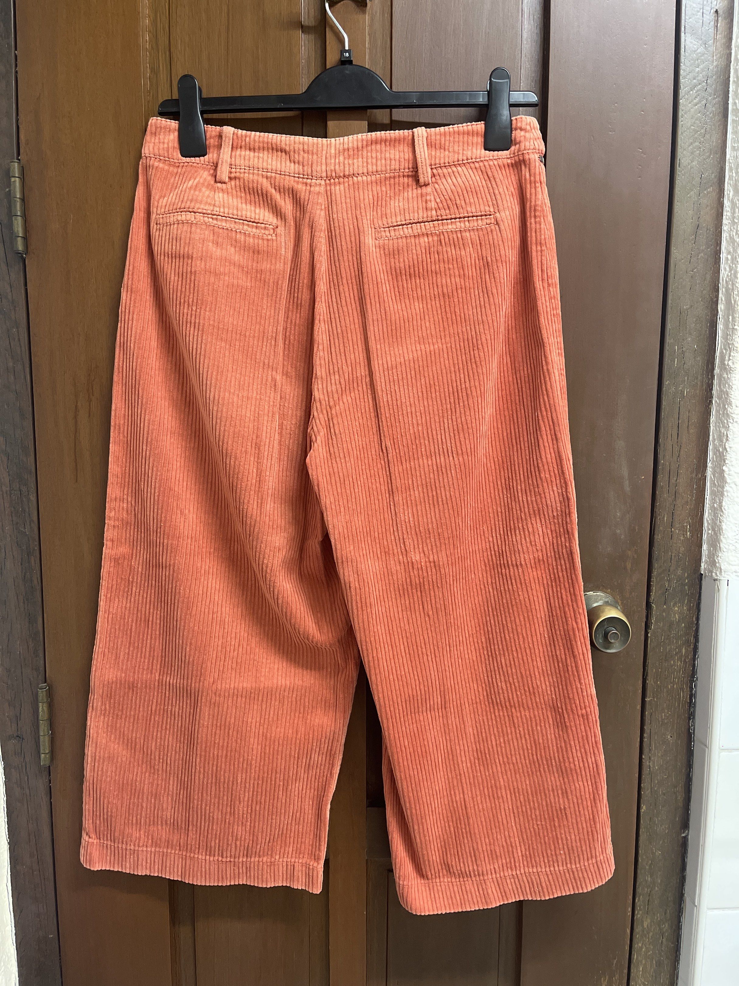Dangerfield Corduroy Culottes (Category: Other Bottoms) located in Muntinlupa City. Submitted by timttam (Listing ID 1419720200, Image 3). Description: - Dangerfield corduroy culottes - Vibrant orange color - Wide-leg design - Button and zipper closure - Features front and back pockets - Comfortable and flattering fit - Perfect for a stylish look.