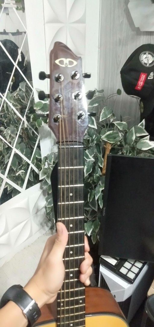 DND Django JR Spruce Acoustic Guitar (Category: Musical Instruments) located in Mandaluyong City. Submitted by allinthehood (Listing ID 1419596098, Image 3). Description: - Acoustic-electric guitar - Natural wood finish - Built-in tuner and preamp - Cutaway design for easy high-fret access - Unique headstock design With Bag and Cord for Amplifier.