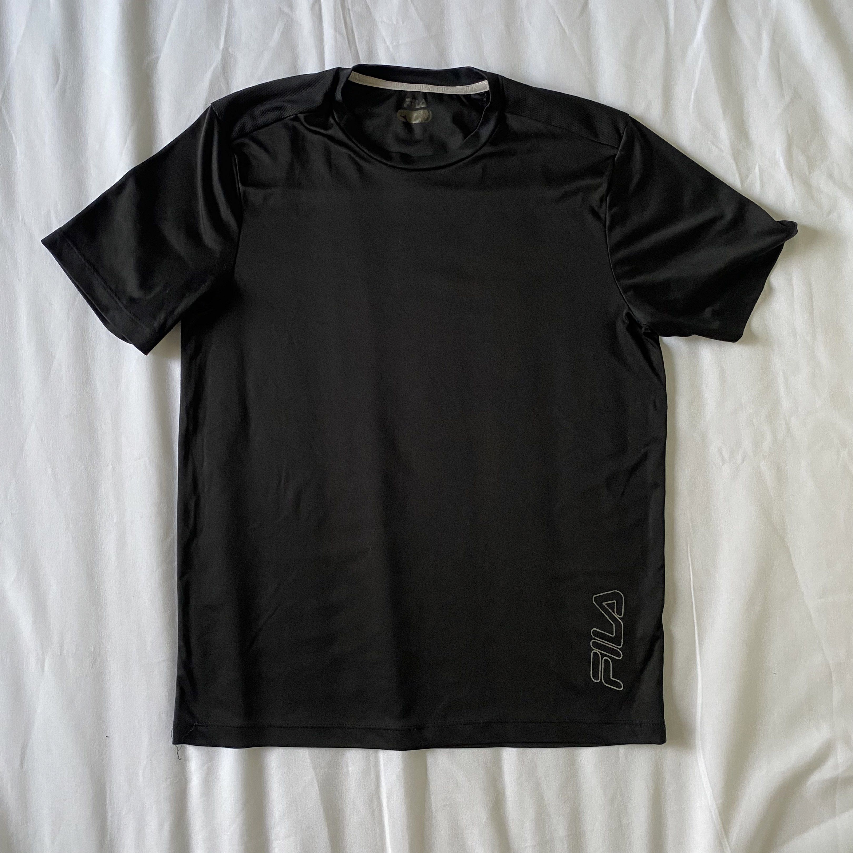 Fila Black Athletic T-shirt (Category: Tshirts & Polo Shirts ) located in Makati City. Submitted by quickfinds (Listing ID 1419596162, Image 1). Description: Dri fit FILA black shirt Best fit slim fit medium .