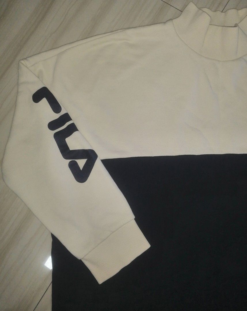 Fila Tracksuit Set - White and Navy (Category: Sets & Coordinates) located in Manila. Submitted by grovesthrift (Listing ID 1419704045, Image 3). Description: - Fila tracksuit set - Color: White and Navy Blue - UNiSEX - Size: M womens - Size: S mens - Top: Color-block design, Fila logo on chest and sleeve - Pants: White stripe detail, Fila logo on left leg - Made in China.