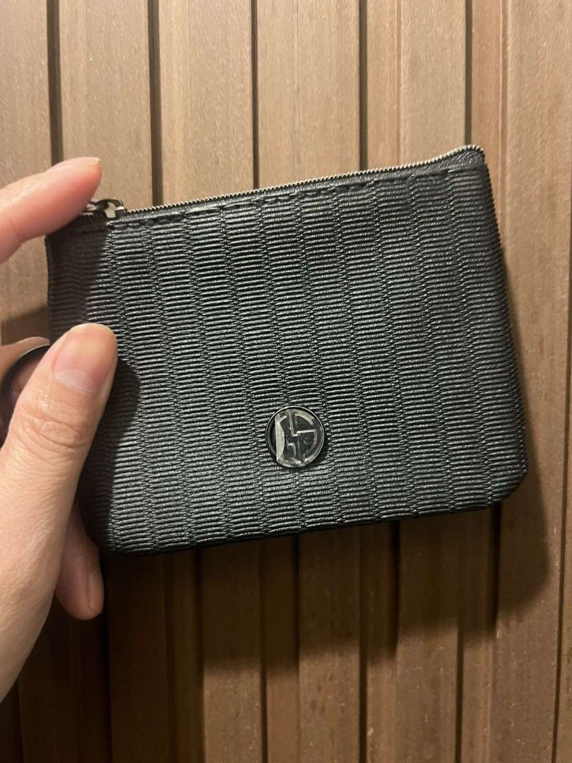 Giorgio Armani Key Pouch and Keychain Set (Category: Luxury Bags & Wallets) located in Paranaque City. Submitted by bagbrained88 (Listing ID 1419650999, Image 3). Description: - Black key pouch and keychain set. - Zippered pouch with a small logo. - Keychain with fabric strap and metal logo emblem. - Made of a textured material. - Perfect for keys and small essentials. - Compact and easy to carry..