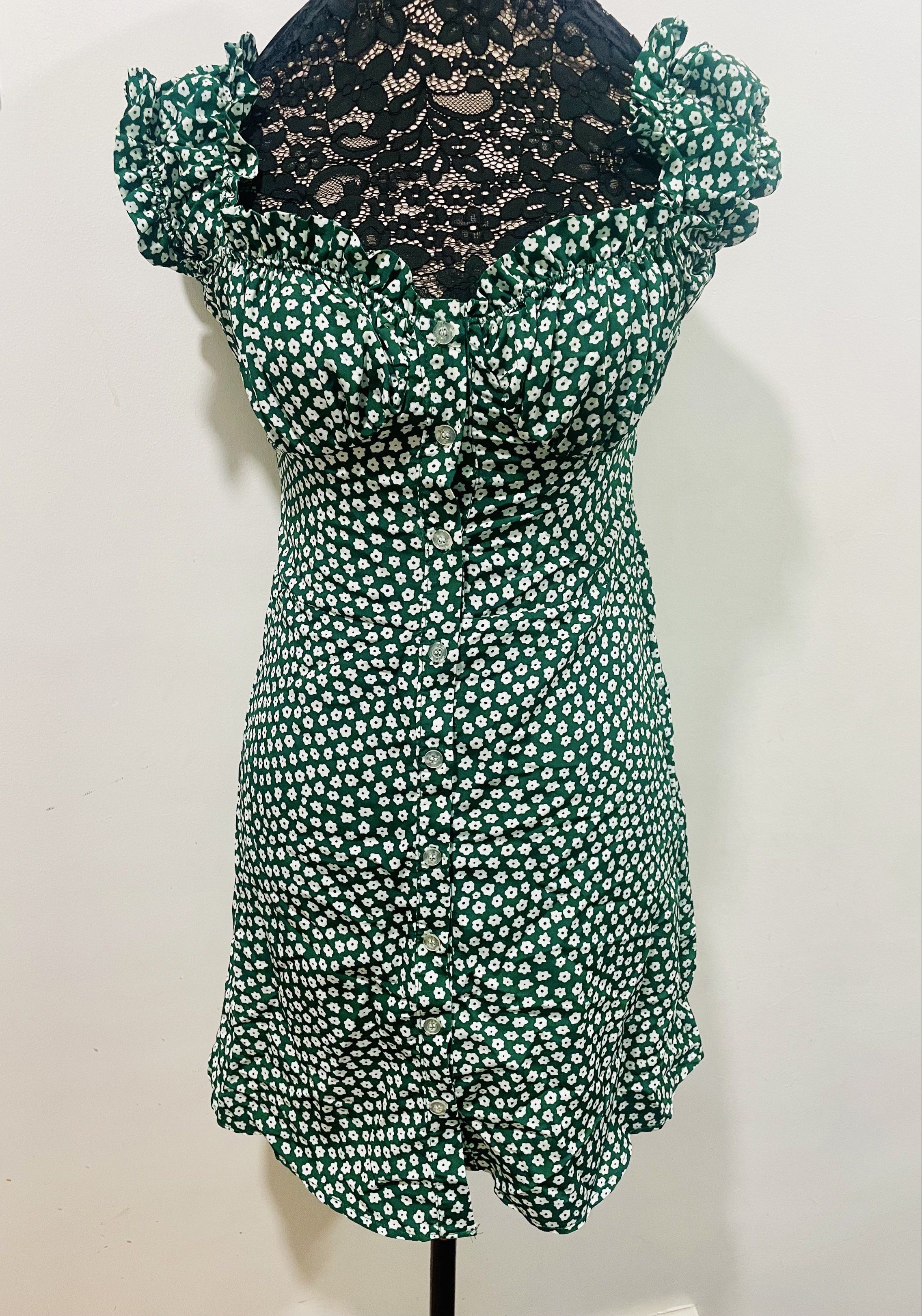 Green floral dress (Category: Dresses) located in San Juan City. Submitted by niqclassythrift (Listing ID 1419776438, Image 1). Description: New with tag What you see is what you get! Fits Medium to semi large.