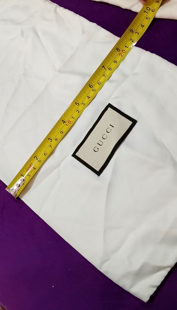 Gucci Dust Bag (Category: Luxury Bags & Wallets) located in Cabanatuan. Submitted by miss.maia (Listing ID 1419757934, Image 2). Description: Authentic Gucci dust bags. The bags are white with the Gucci logo in the center. The bags have a drawstring closure. The dimensions are approximately 18 inches in length. 580 each 3pcs available nego for take all +sf brand-new condition There are three dust bags available..