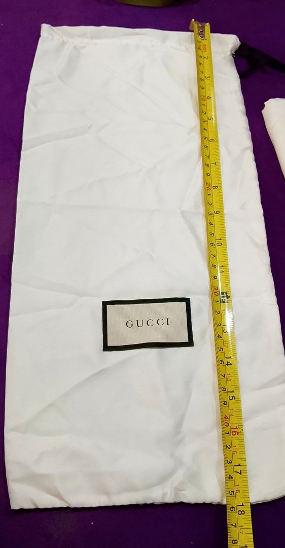 Gucci Dust Bag (Category: Luxury Bags & Wallets) located in Cabanatuan. Submitted by miss.maia (Listing ID 1419757934, Image 1). Description: Authentic Gucci dust bags. The bags are white with the Gucci logo in the center. The bags have a drawstring closure. The dimensions are approximately 18 inches in length. 580 each 3pcs available nego for take all +sf brand-new condition There are three dust bags available..