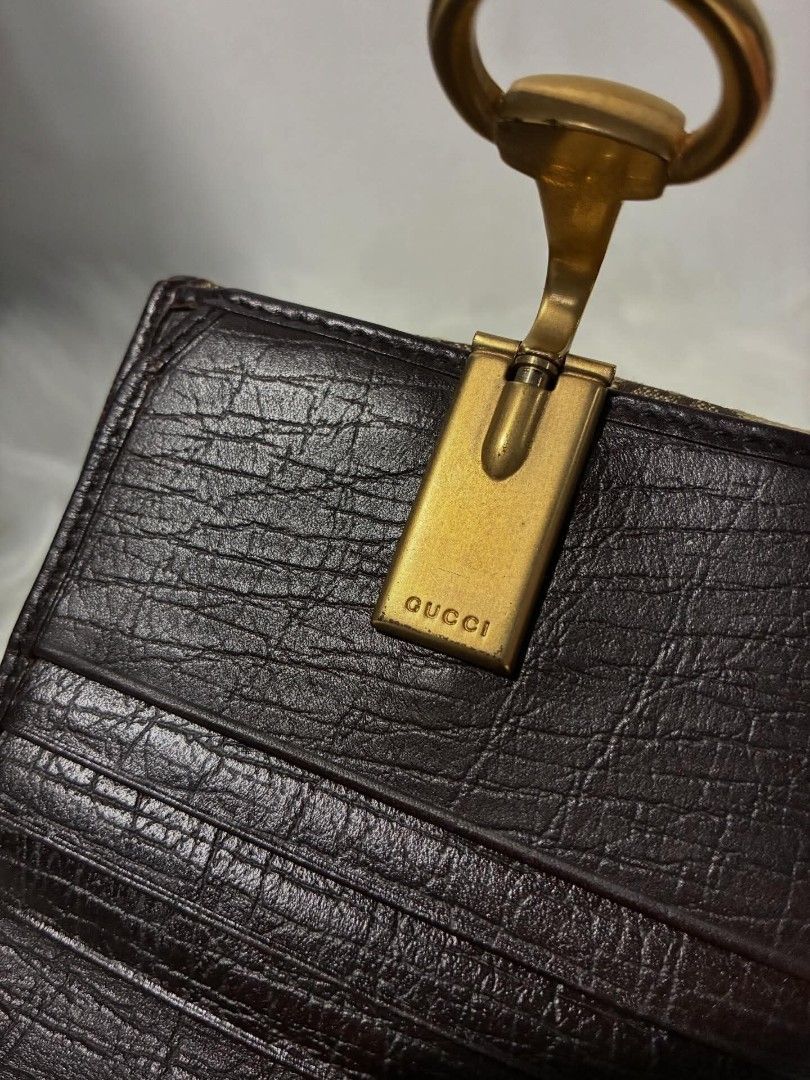 Gucci Horsebit Wallet (Category: Luxury Bags & Wallets) located in Bacolod City. Submitted by sh33natole.07 (Listing ID 1419740683, Image 2). Description: Canvas Horsebit Compact Wallet Condition: 8/10 💯 Authentic - Authentic Gucci Horsebit wallet - Iconic GG canvas and leather trim - Includes original box and paperwork - Gold-tone horsebit detail - Snap closure - Multiple card slots and compartments - Made in Italy ✅ Store Receipt ✅ With box ✅️