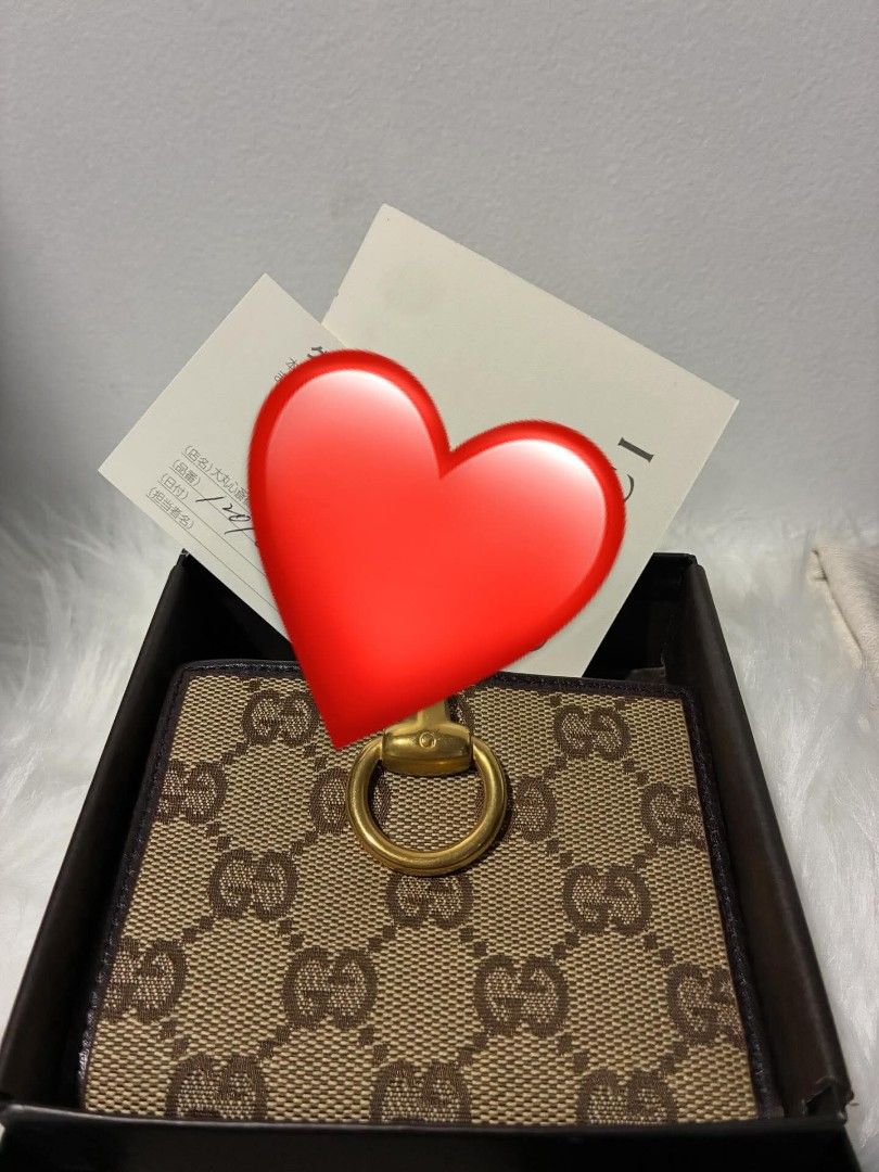 Gucci Horsebit Wallet (Category: Luxury Bags & Wallets) located in Bacolod City. Submitted by sh33natole.07 (Listing ID 1419740683, Image 1). Description: Canvas Horsebit Compact Wallet Condition: 8/10 💯 Authentic - Authentic Gucci Horsebit wallet - Iconic GG canvas and leather trim - Includes original box and paperwork - Gold-tone horsebit detail - Snap closure - Multiple card slots and compartments - Made in Italy ✅ Store Receipt ✅ With box ✅️