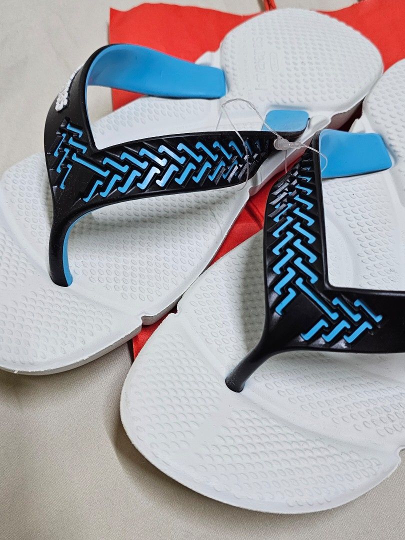 Havaianas White Flip-flops POWER 2.0 (Category: Slippers and slides) located in Manila. Submitted by naserrano (Listing ID 1419736183, Image 2). Description: - unused Authentic Havaianas flip-flops - Color: White with blue and black accents - Size: 39/40 (27 cm) - Features textured sole for grip and comfort - Comes with original Havaianas bag original price: 1899.00.