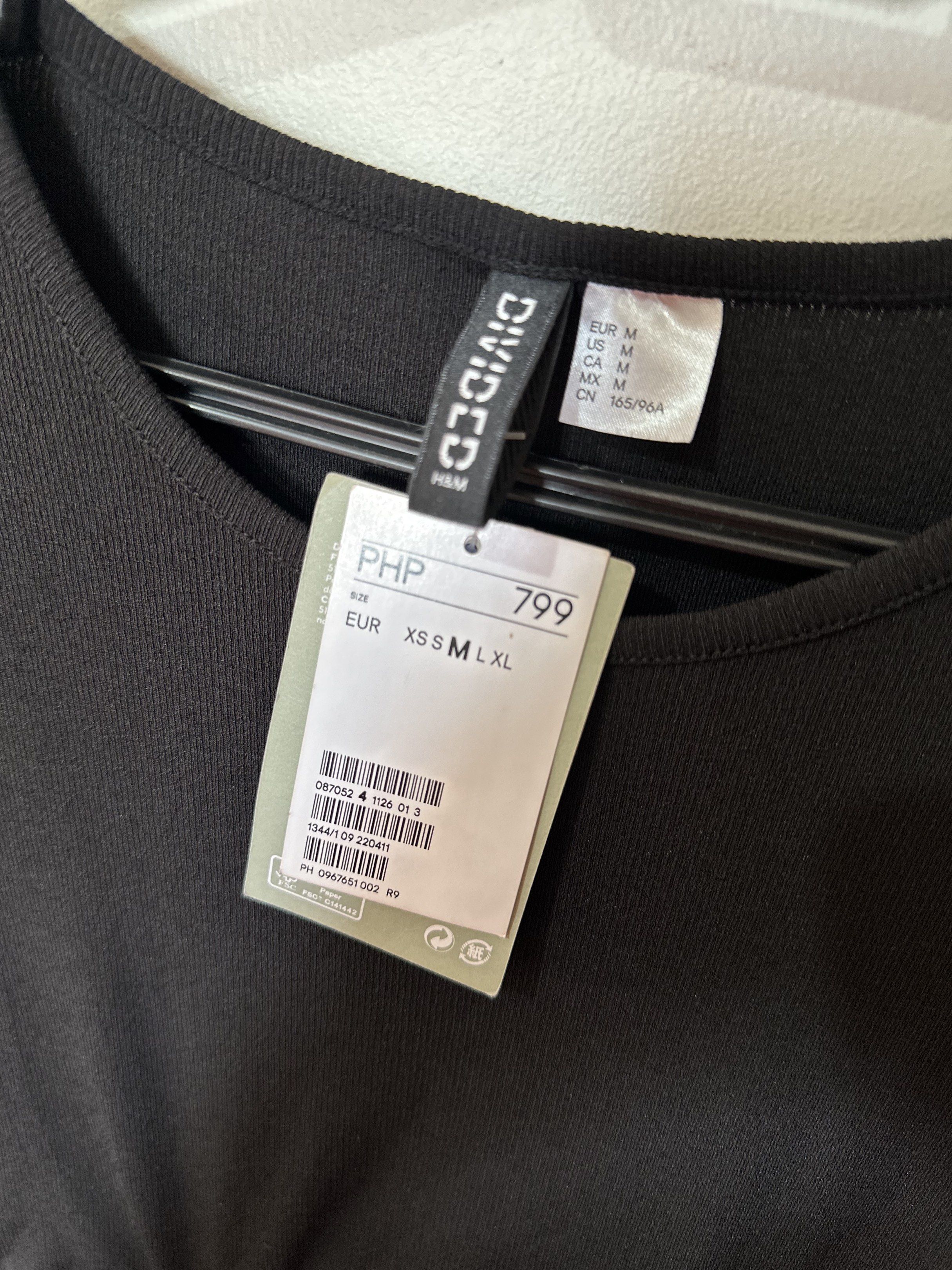 H&M Divided Black Ruched Dress (Category: Dresses) located in Manila. Submitted by jfrancesg (Listing ID 1419651740, Image 3). Description: - original price: ₱799 - ruched detailing - adjustable ties at hem - stretchable fabric notes - never worn outside, only fitted - DM for more pics/ vids mop: gcash/ bpi mod: ggx/ sdd within manila/ meetup (SM north).