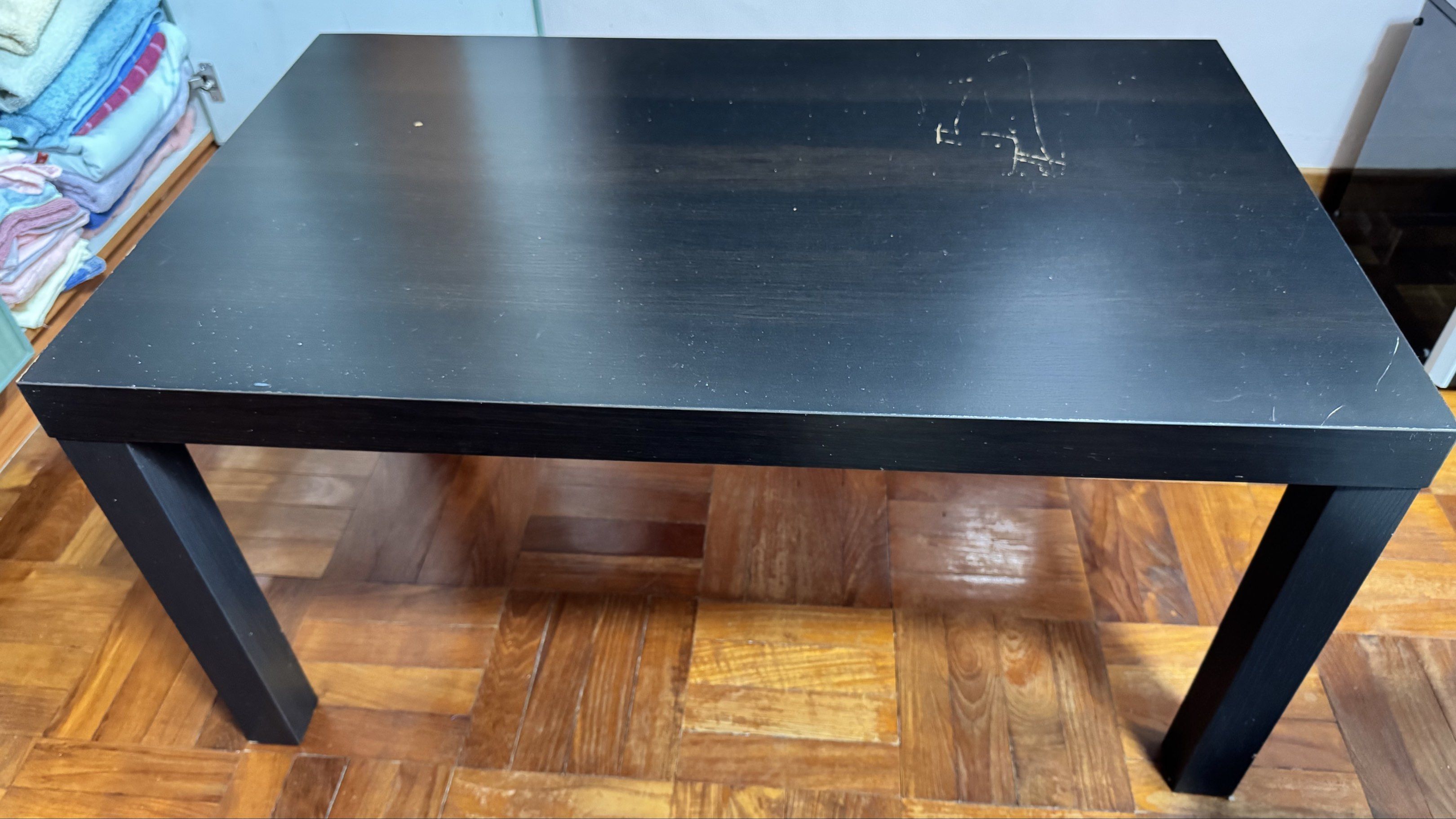 IKEA Black Rectangular Table (Category: Tables & Sets) located in Singapore. Submitted by Nova3388 (Listing ID 1419744366, Image 3). Description: - Black rectangular table 900x550x460 ht - Sturdy legs - Ideal for small dining or desk use Some slight scratches - Self-collection only.