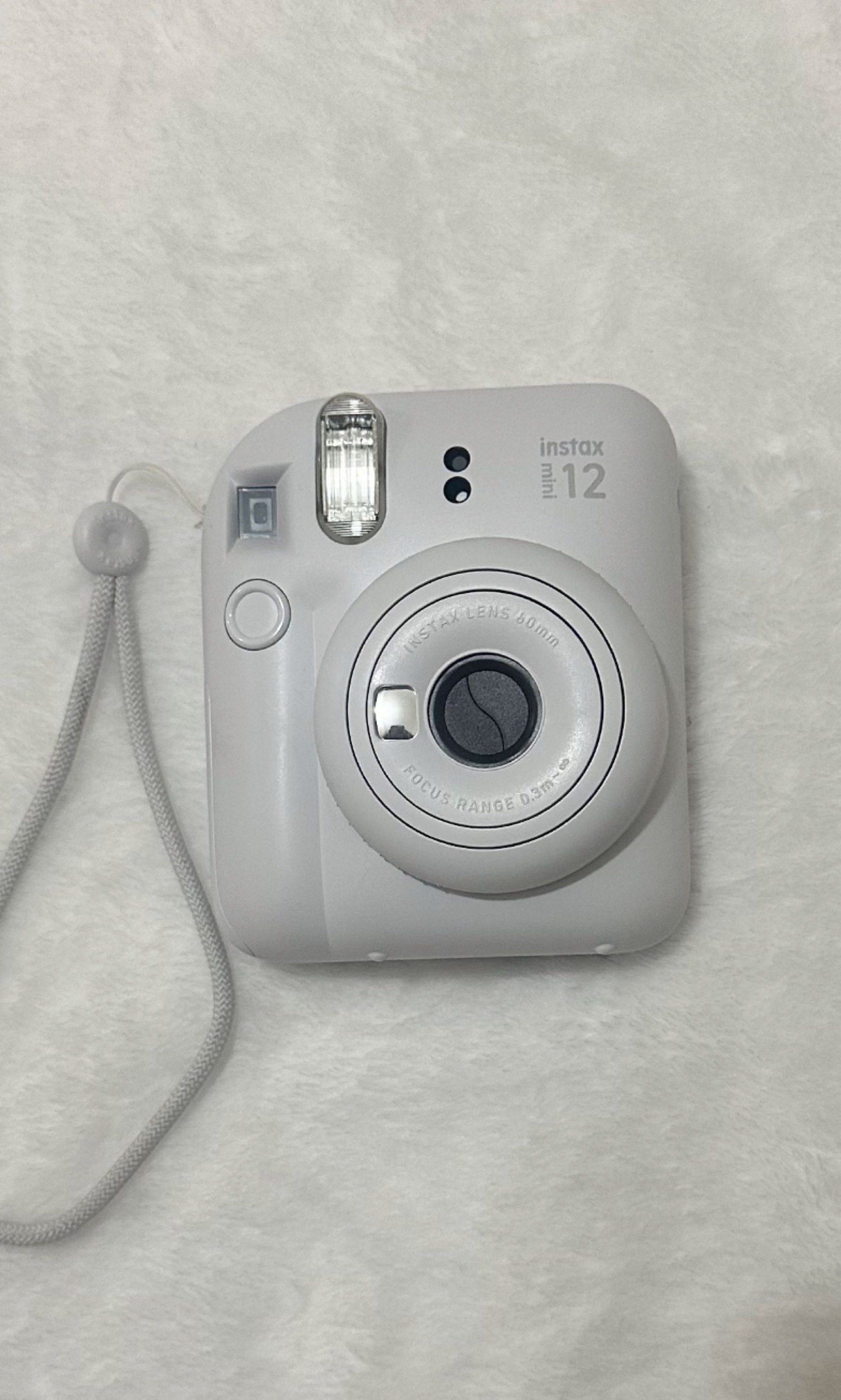 Instax Mini 12 Camera Set with Bag and Accessories (Category: Cameras) located in Pasig City. Submitted by prelovedoftang (Listing ID 1419618728, Image 2). Description: Last chance to buy this Mini 12 instax. Pag di niyo pa binili di ko na ibebenta hahahahhaha.