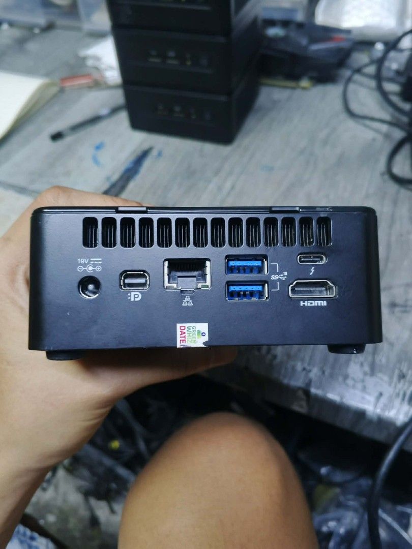 Intel NUC11PAH Mini PC (Category: Desktops) located in Manila. Submitted by trvpspxt (Listing ID 1419753222, Image 2). Description: Intel nuc i7 11th gen 16gb ram 256gb ssd windows 11 plug and play pick up or lalamove - Intel NUC11PAH Mini PC - Multiple Ports: USB, HDMI, Ethernet - Power Input: 19V, 6.32A - Manufactured: May 2021 - Model: AX201D2W - Front Panel: Power button and audio jack.