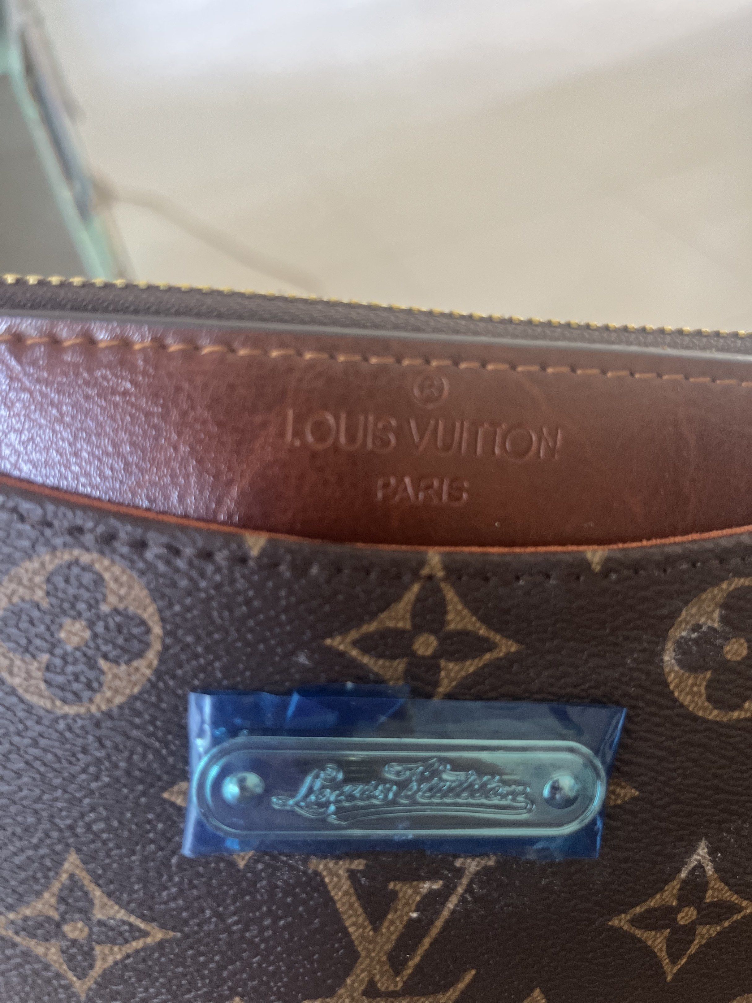 Louis Vuitton Monogram Clutch (Category: Luxury Bags & Wallets) located in Daanbantayan. Submitted by christinet58475 (Listing ID 1419654099, Image 3). Description: - Louis Vuitton clutch - Classic monogram canvas - Zip closure - Interior pockets - Detachable strap - Includes dust bag - Brown leather lining - Gold-tone hardware - Made in France.