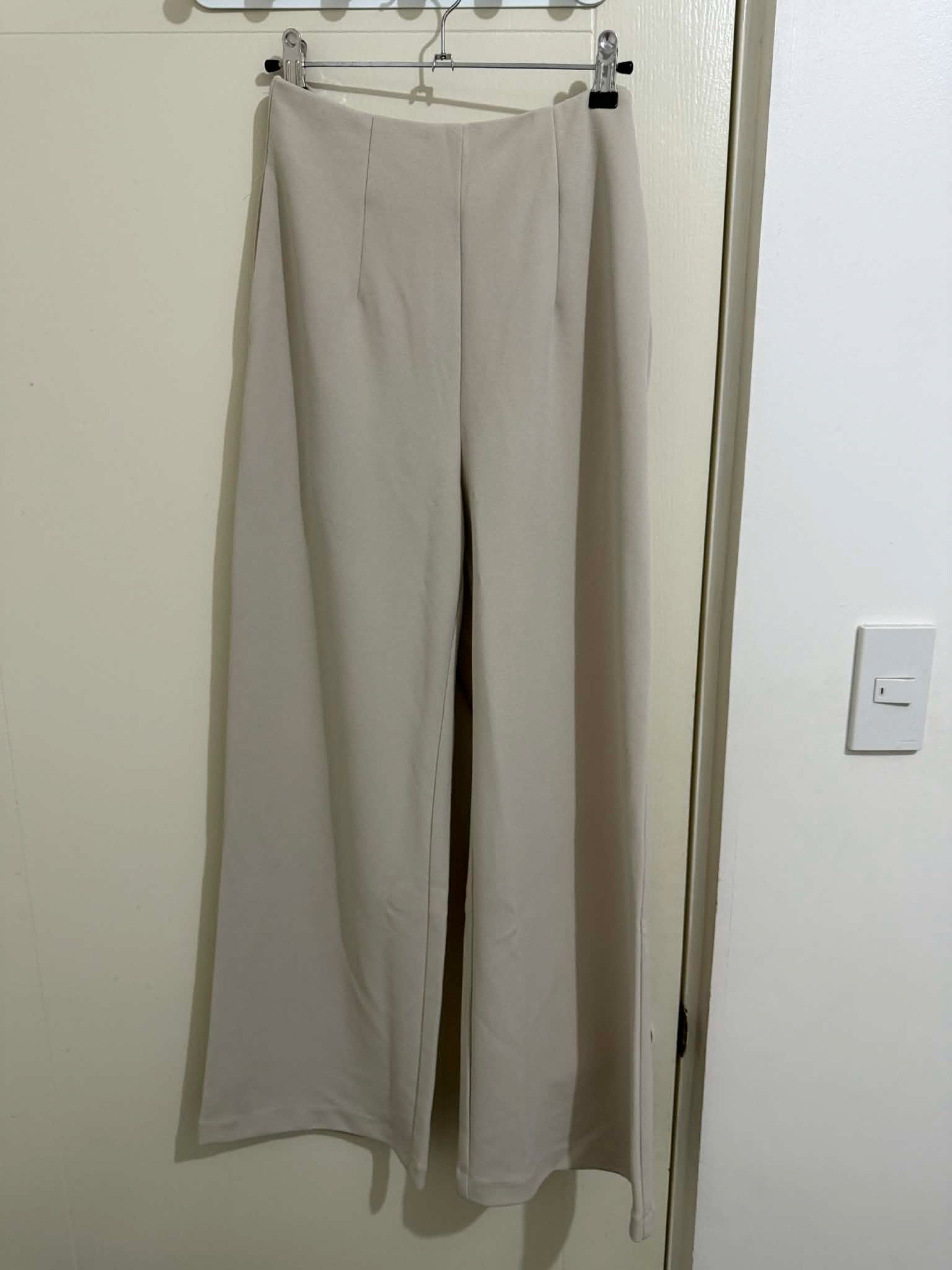 Love, Bonito Wide Leg Pants (Category: Other Bottoms) located in Dasmarinas. Submitted by abebibobu (Listing ID 1419739137, Image 1). Description: - Love, Bonito wide-leg pants - Color: Beige - Size: LB XS (UK 6, US 2) - Features: Wide-leg, zipper closure at the back - Condition: with minor himolmol - Versatile style.