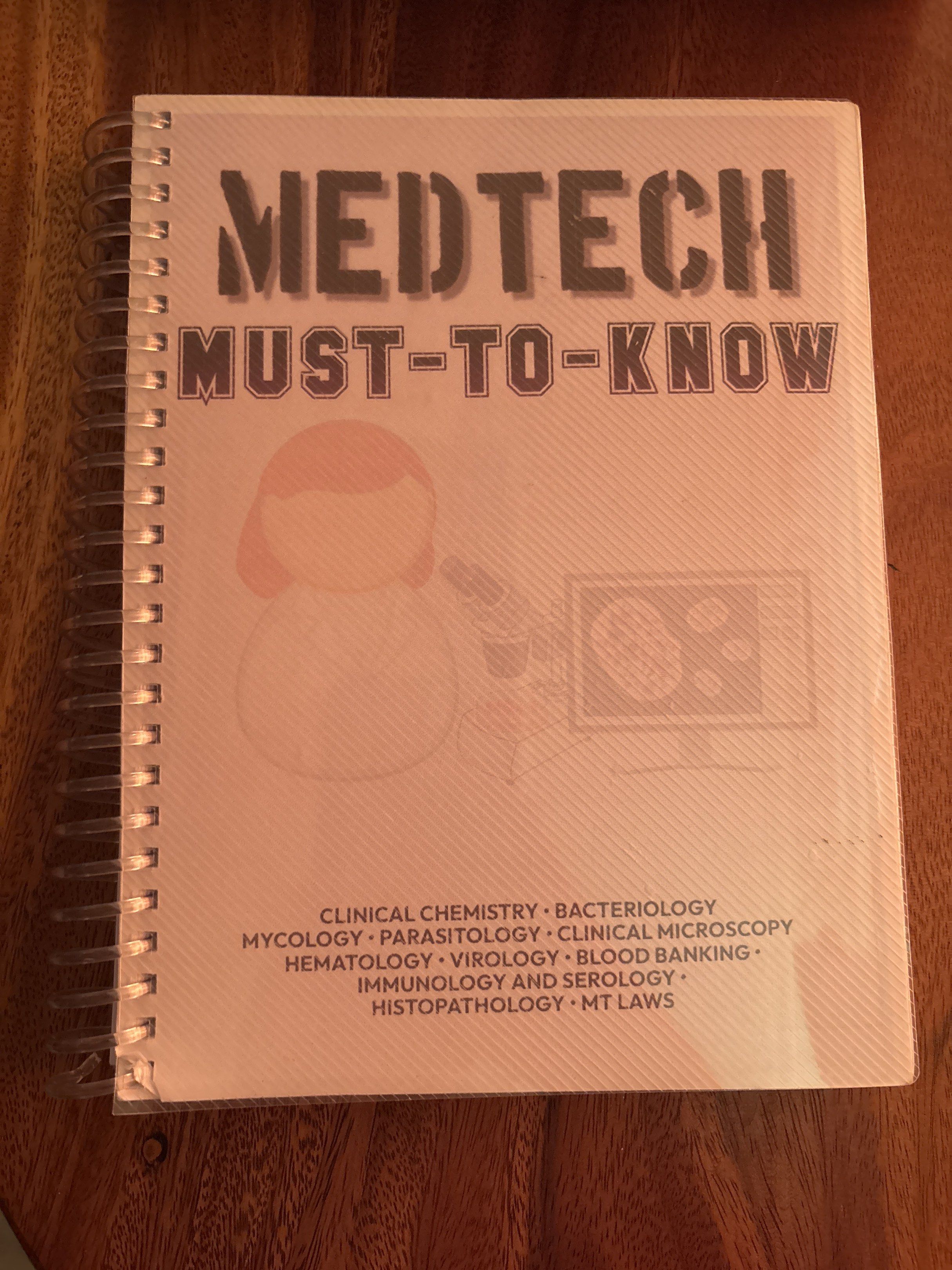 MedTech Must-To-Know Review Book (Category: Textbooks) located in Vigan. Submitted by aizyyy09 (Listing ID 1419599370, Image 1). Description: - Covers essential MedTech topics: Clinical Chemistry, Bacteriology, Mycology, Parasitology, Clinical Microscopy, Hematology, Virology, Blood Banking, Immunology and Serology, Histopathology, and MT Laws. - Perfect for MedTech students. - Spiral-bound for easy studying..