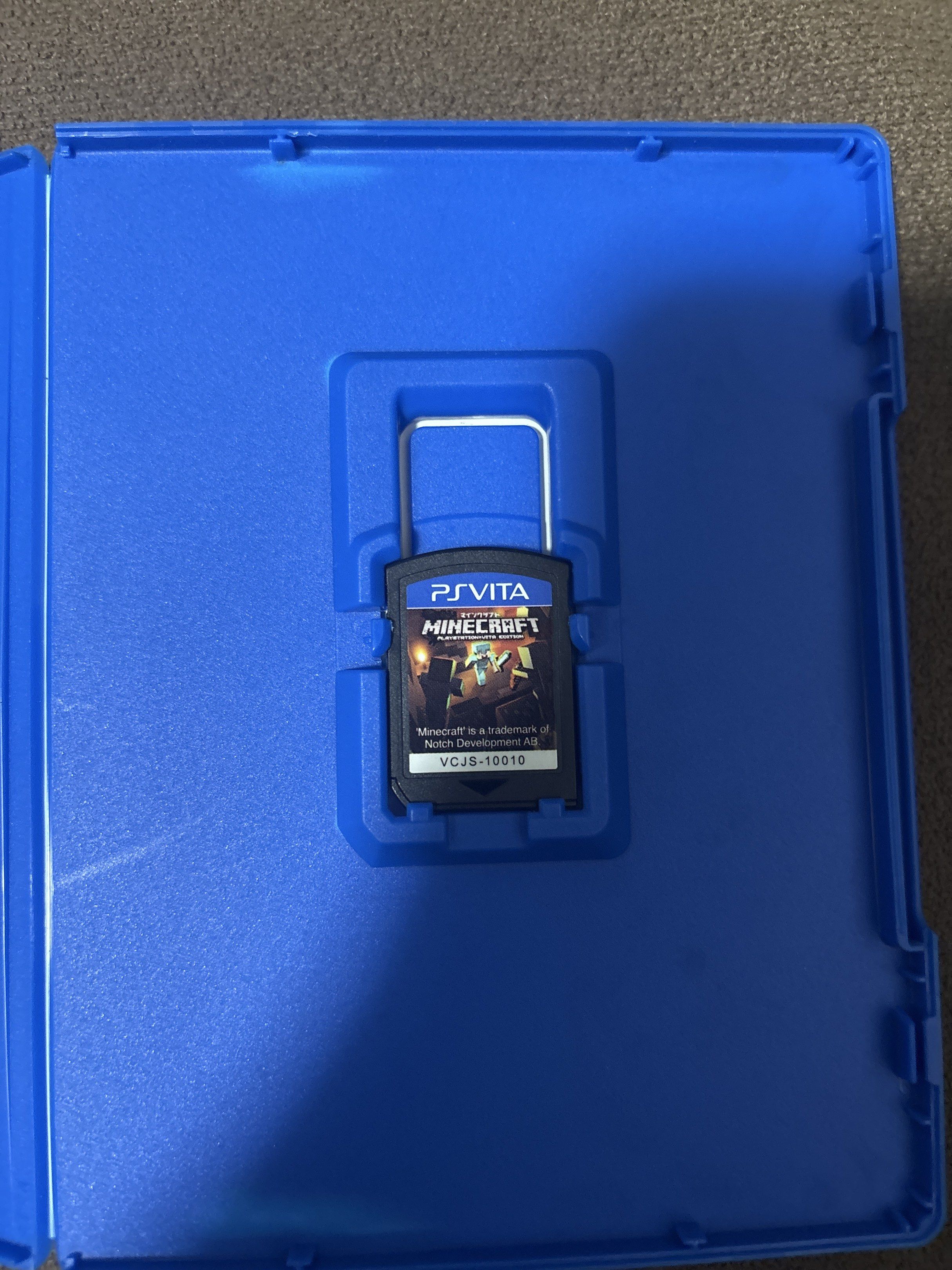 Minecraft PlayStation Vita Edition (Category: PlayStation) located in Manila. Submitted by leanbanana (Listing ID 1419695140, Image 3). Description: QC AREA NEGOTIABLE - Minecraft PlayStation Vita Edition game - Includes game cartridge and case - Case color: Blue - Features the Minecraft logo - Game language: English, Japanese - Compatible with PlayStation Vita console - Case back shows screenshots and game details.