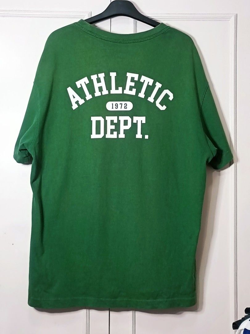 Nike Athletic Dept. Green T-shirt (Category: Tshirts & Polo Shirts ) located in Pasig City. Submitted by capwayph (Listing ID 1419620268, Image 2). Description: - Green Nike t-shirt - White "Nike" logo on front - "ATHLETIC DEPT. 1972" print on back - Crew neck - Short sleeves - Standard fit -No issue. -color rate 9.5/10.