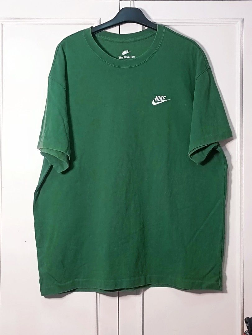 Nike Athletic Dept. Green T-shirt (Category: Tshirts & Polo Shirts ) located in Pasig City. Submitted by capwayph (Listing ID 1419620268, Image 1). Description: - Green Nike t-shirt - White "Nike" logo on front - "ATHLETIC DEPT. 1972" print on back - Crew neck - Short sleeves - Standard fit -No issue. -color rate 9.5/10.