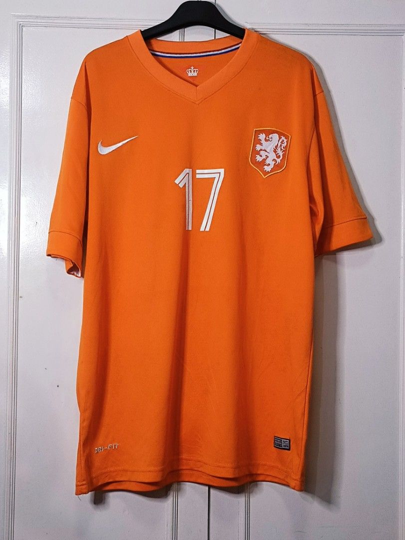 Nike Netherlands National Team Jersey (Category: Activewear) located in Pasig City. Submitted by capwayph (Listing ID 1419625960, Image 1). Description: - Orange Netherlands Nike jersey - Features the team crest - Number 17 on the front - Nike logo on the chest - V-neck collar - Short sleeves - Made of breathable material - Minor crack prints.