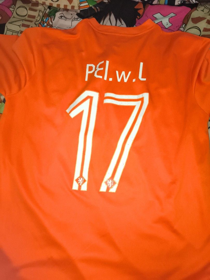 Nike Netherlands National Team Jersey (Category: Activewear) located in Pasig City. Submitted by capwayph (Listing ID 1419625960, Image 2). Description: - Orange Netherlands Nike jersey - Features the team crest - Number 17 on the front - Nike logo on the chest - V-neck collar - Short sleeves - Made of breathable material - Minor crack prints.