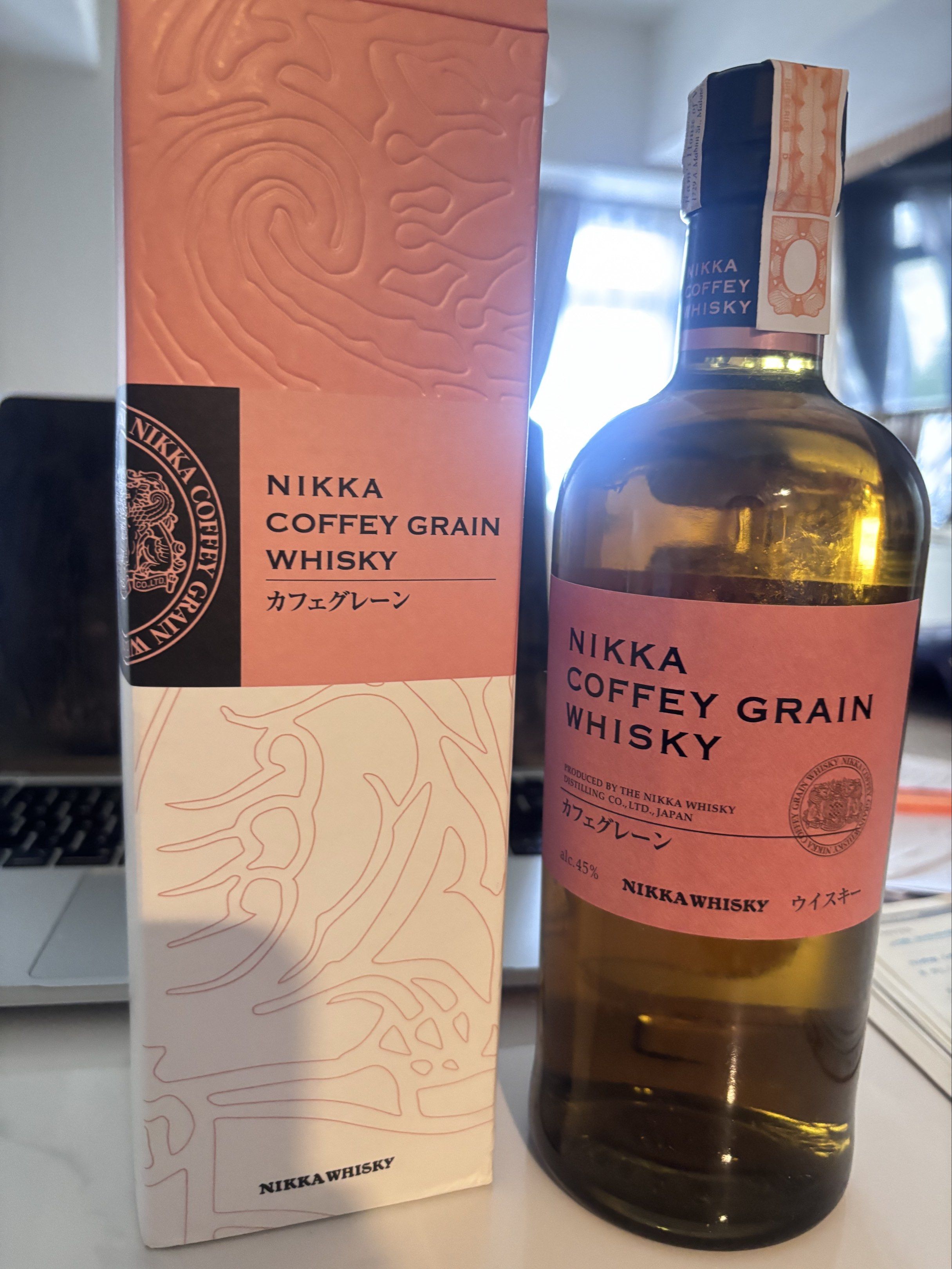 Nikka Coffey Grain Whisky 700ml (Category: Beverages) located in Pasig City. Submitted by maeqshops (Listing ID 1419621680, Image 1). Description: Nikka Coffey Grain Whisky. Produced by The Nikka Whisky Distilling Co. Ltd., Japan. The bottle contains 700ml and has an alcohol content of 45%. The whisky is described as having a nice golden hue with aromas of ripe pear, cherry, and exotic fruit. The palate is described as juicy and pleasant, with no