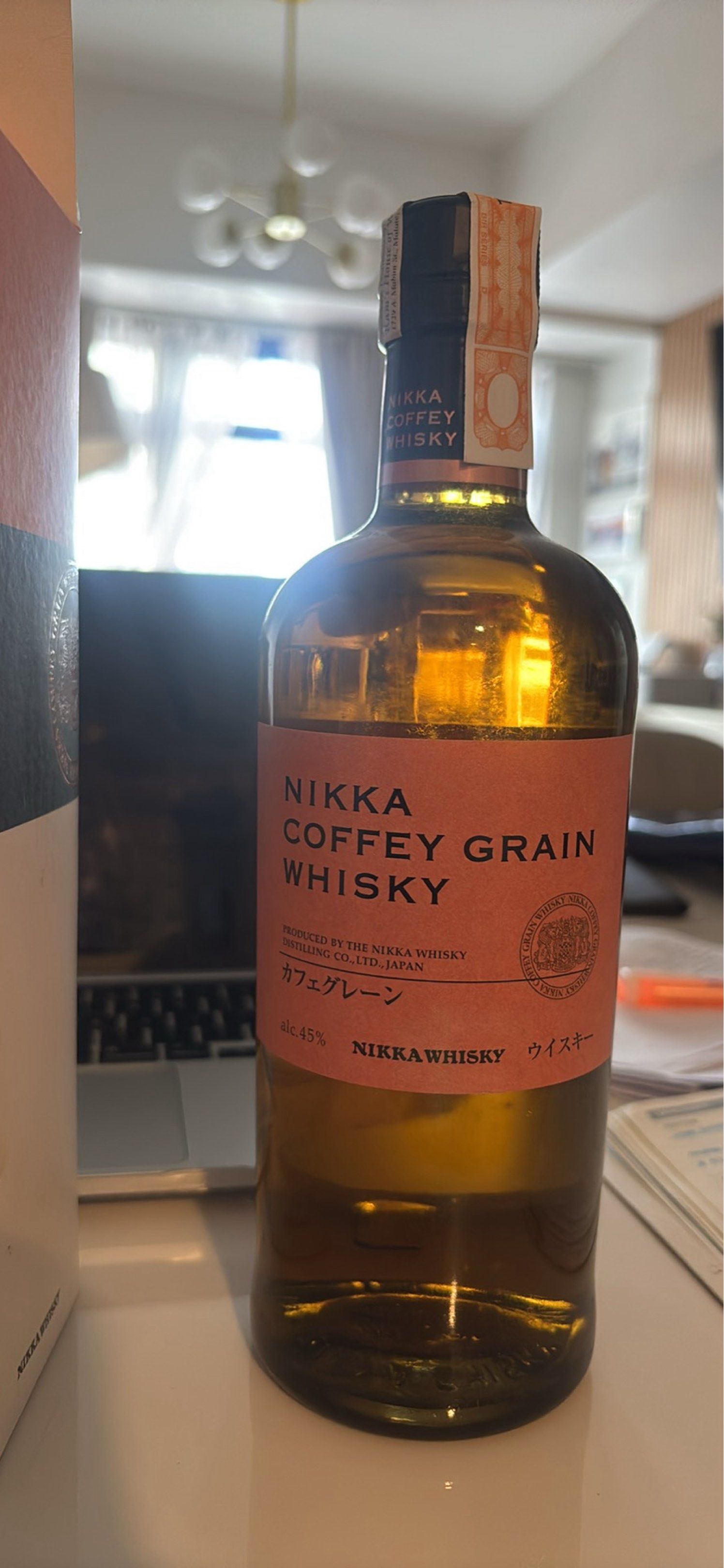 Nikka Coffey Grain Whisky 700ml (Category: Beverages) located in Pasig City. Submitted by maeqshops (Listing ID 1419621680, Image 2). Description: Nikka Coffey Grain Whisky. Produced by The Nikka Whisky Distilling Co. Ltd., Japan. The bottle contains 700ml and has an alcohol content of 45%. The whisky is described as having a nice golden hue with aromas of ripe pear, cherry, and exotic fruit. The palate is described as juicy and pleasant, with no